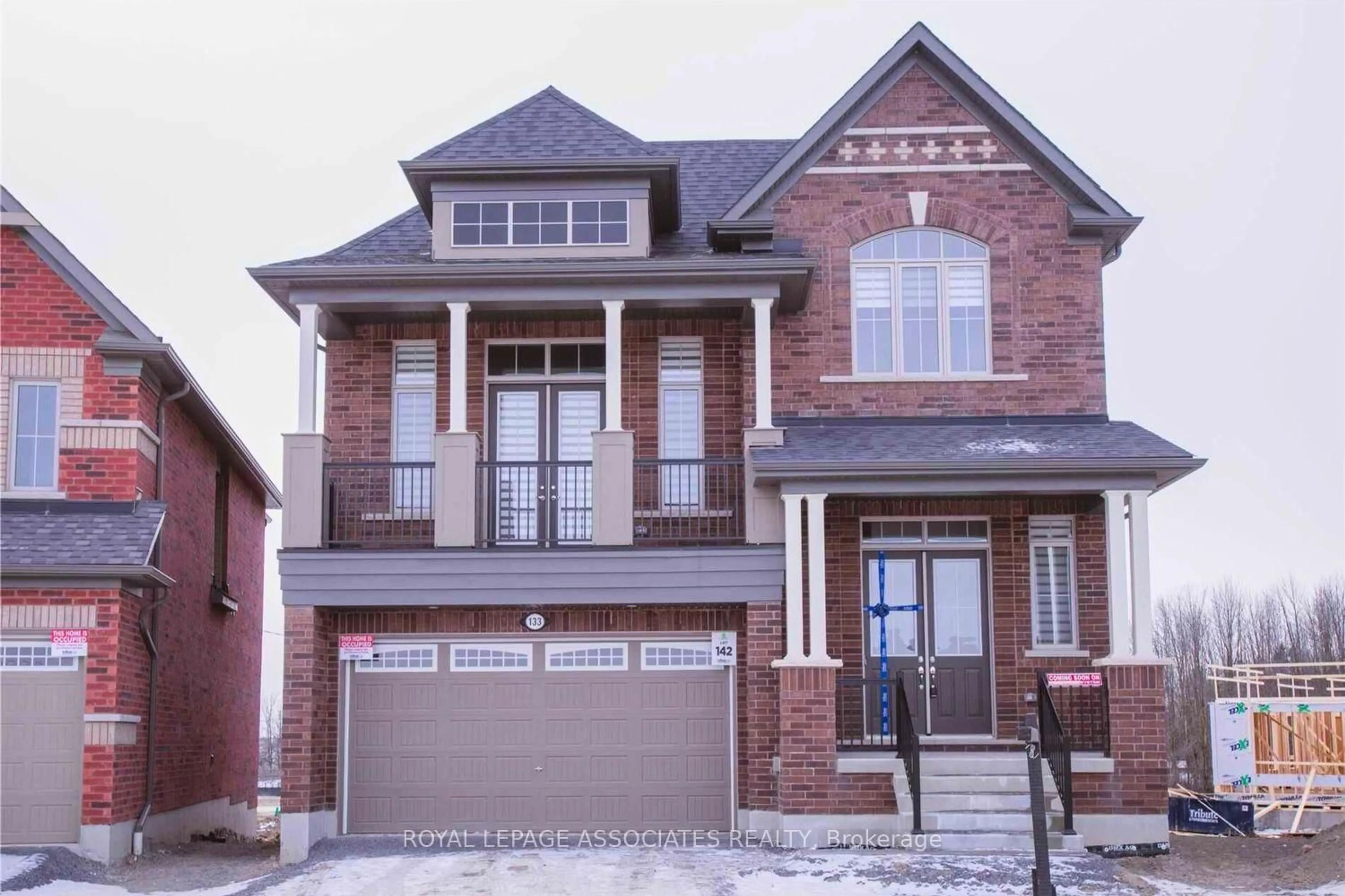 Home with brick exterior material, street for 133 Marcel Brunnelle Dr, Whitby Ontario L1P 0G7