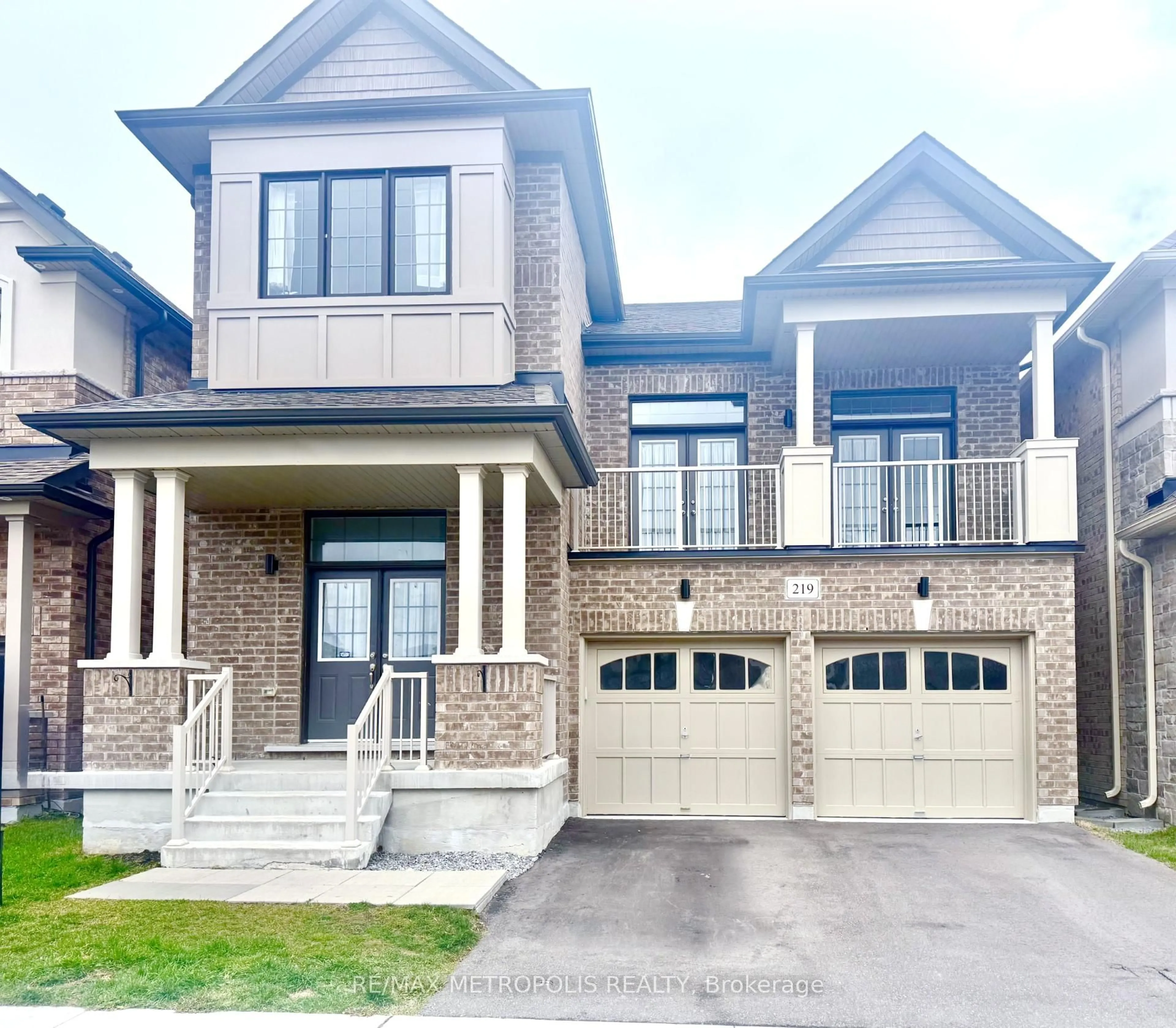 Home with brick exterior material, street for 219 Doug Finney St, Oshawa Ontario L1K 3G3