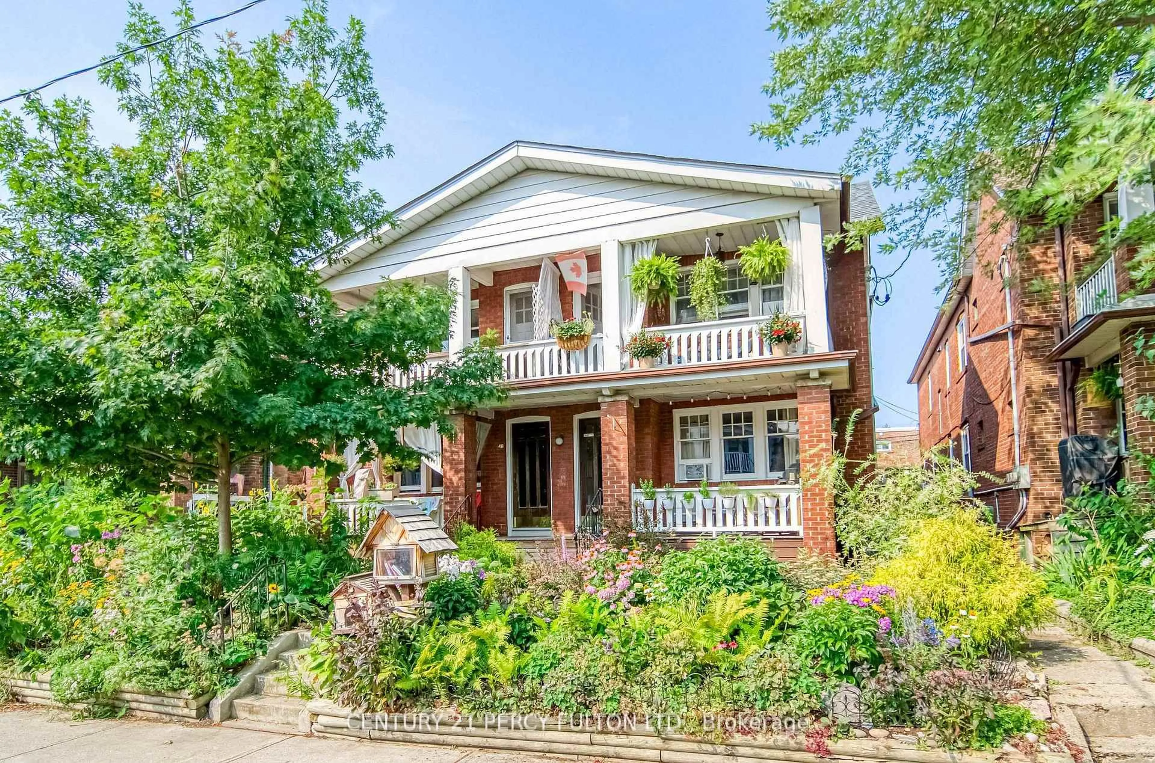 Home with brick exterior material, street for 48-50 Scarboro Beach Blvd, Toronto Ontario M4E 2X1