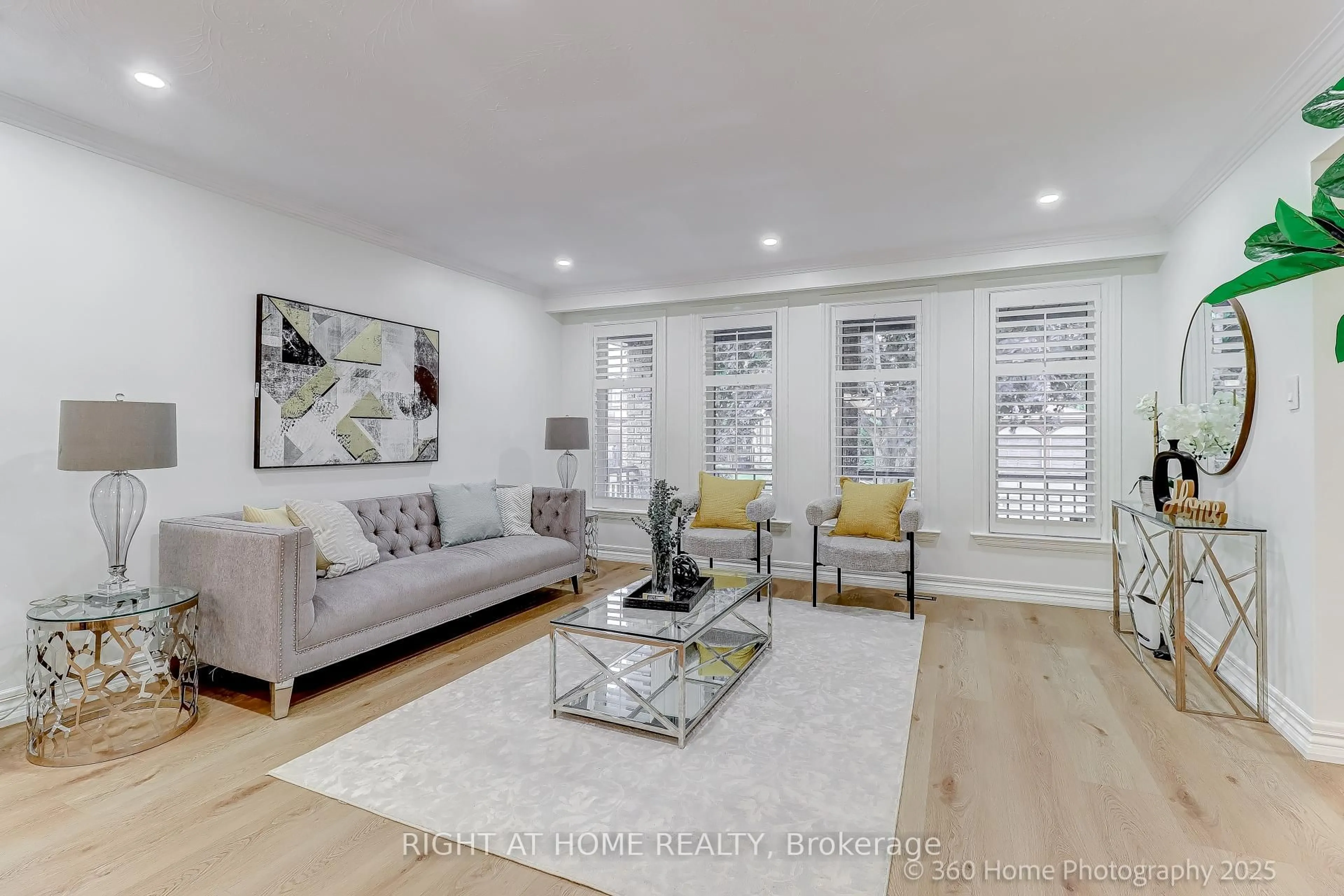 Living room with furniture, wood/laminate floor for 44 Beamsville Dr, Toronto Ontario M1T 3S2