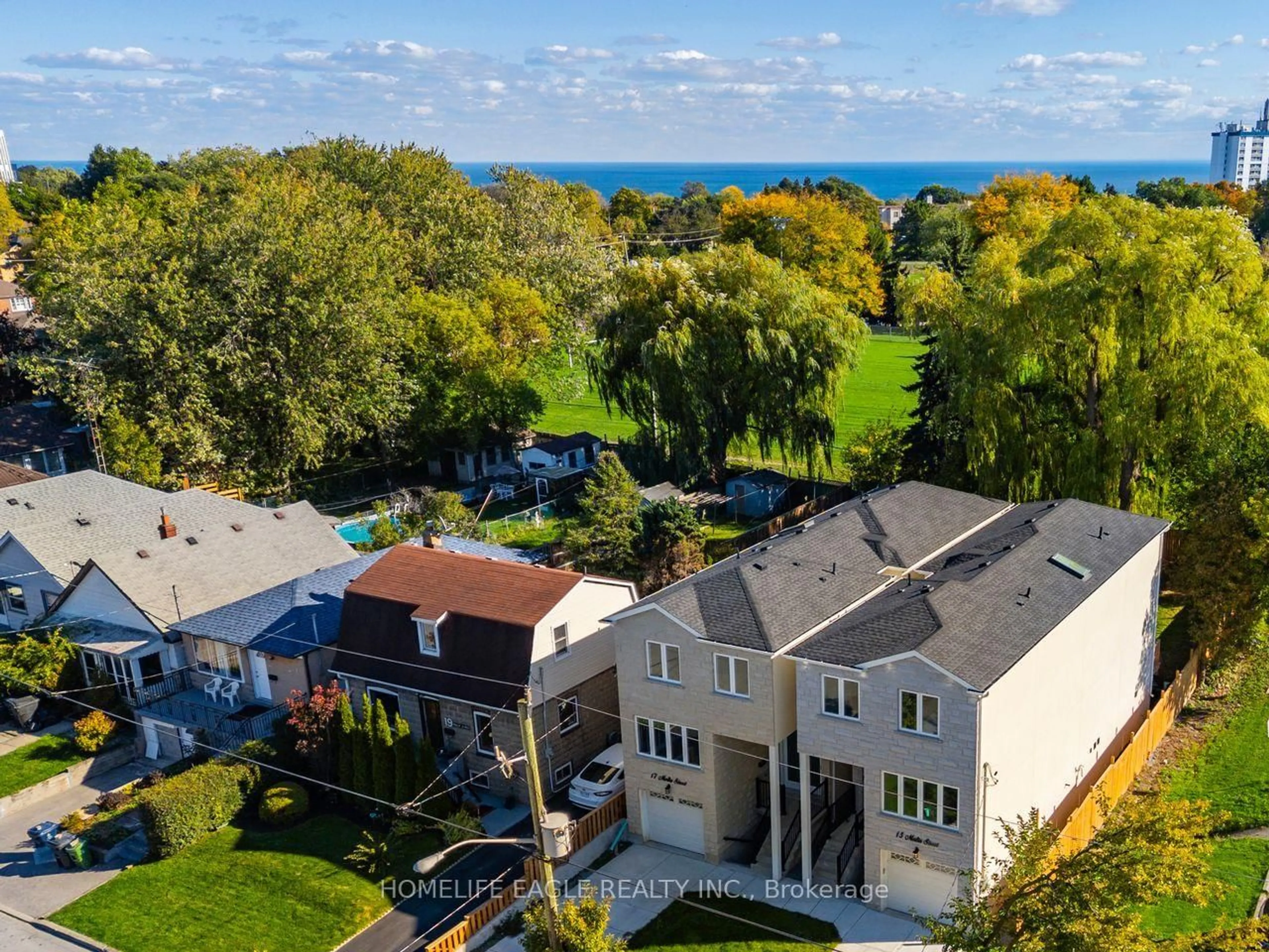 A pic from outside/outdoor area/front of a property/back of a property/a pic from drone, water/lake/river/ocean view for 15 Malta St, Toronto Ontario M1N 2L2