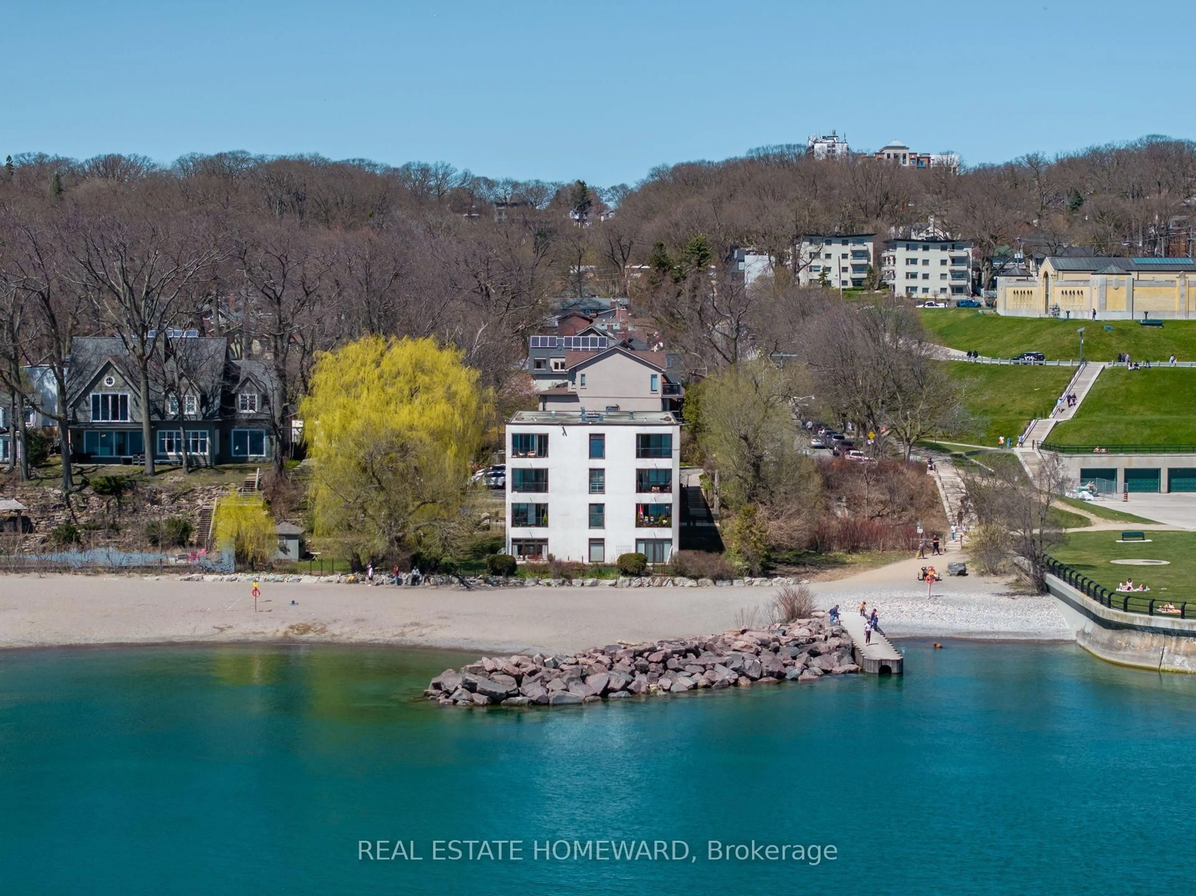 A pic from outside/outdoor area/front of a property/back of a property/a pic from drone, water/lake/river/ocean view for 2 Nursewood Rd #2, Toronto Ontario M4E 3R8