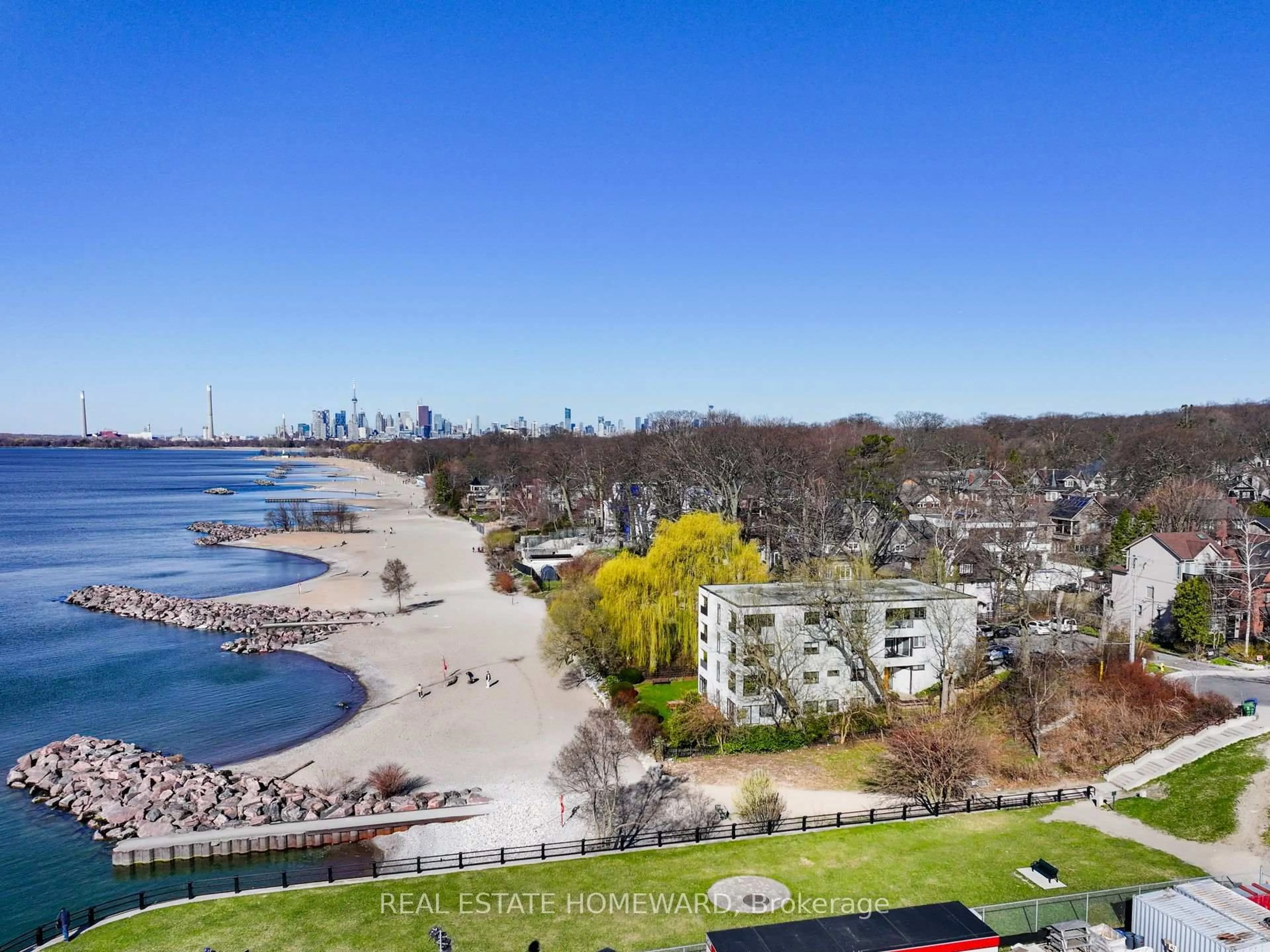 A pic from outside/outdoor area/front of a property/back of a property/a pic from drone, water/lake/river/ocean view for 2 Nursewood Rd #2, Toronto Ontario M4E 3R8