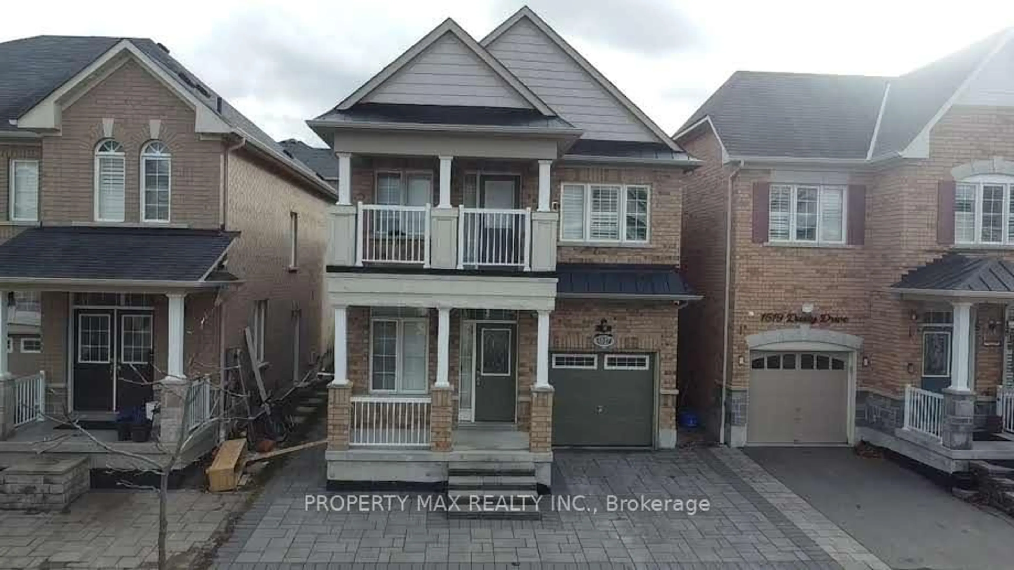 Home with brick exterior material, street for 1517 Dusty Dr, Pickering Ontario L1X 0C8