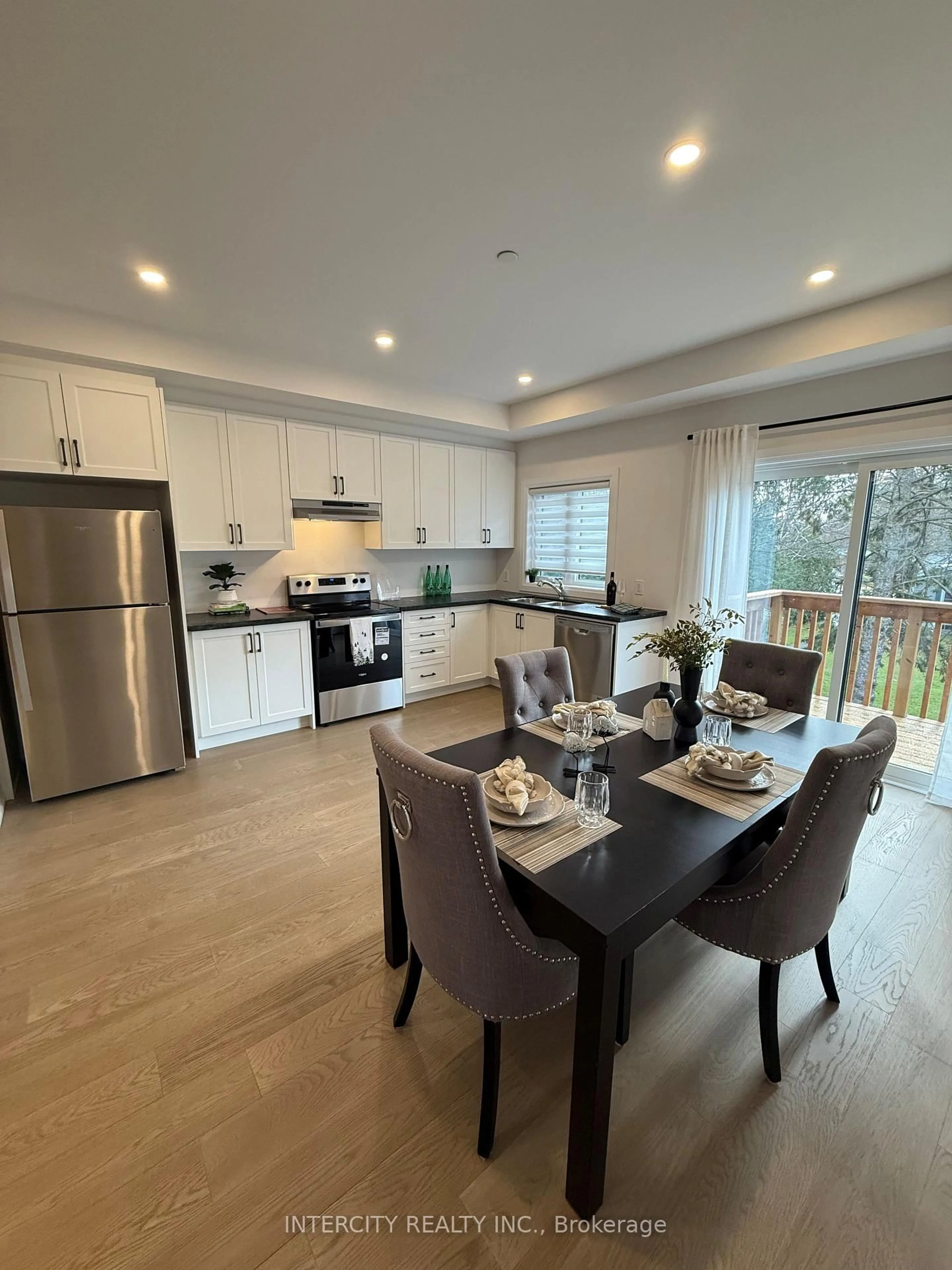 Open concept kitchen, wood/laminate floor for 67 Marret Lane, Clarington Ontario L1B 1J2