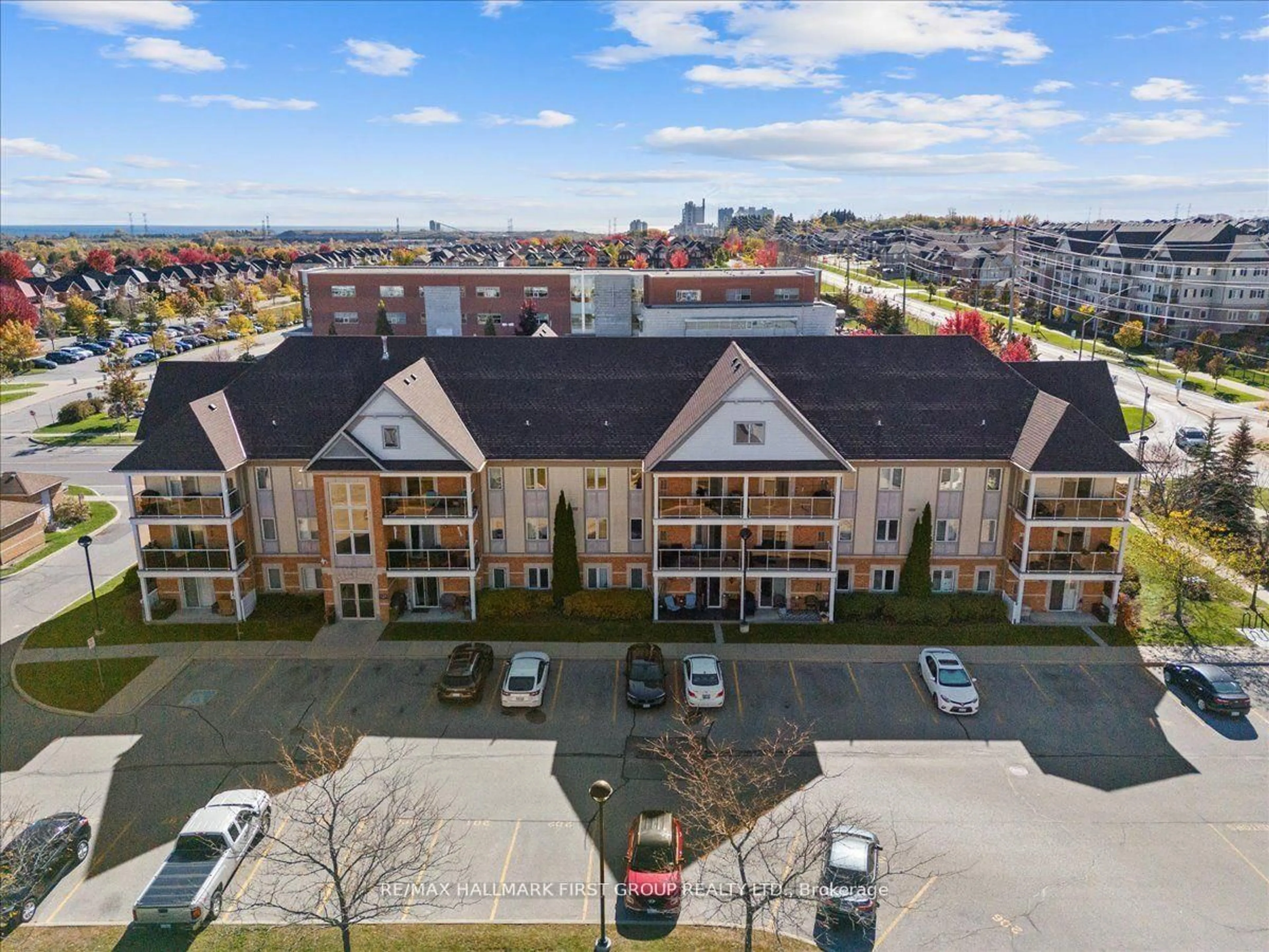 A pic from outside/outdoor area/front of a property/back of a property/a pic from drone, city buildings view from balcony for 132 Aspen Springs Dr #204, Clarington Ontario L1C 0H1