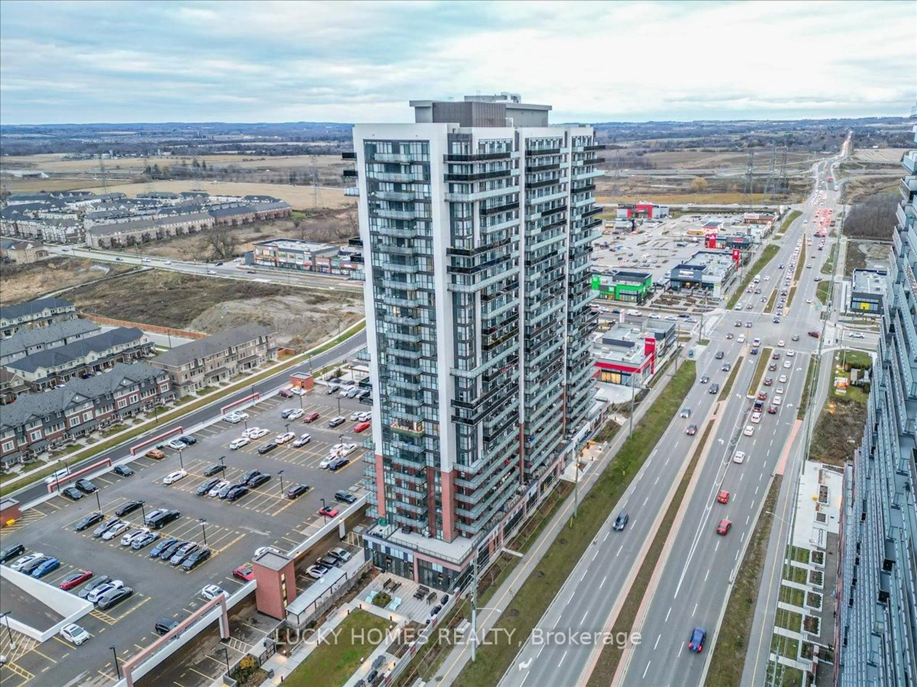 A pic from outside/outdoor area/front of a property/back of a property/a pic from drone, unknown for 2550 Simcoe St #317, Oshawa Ontario L1L 0R5