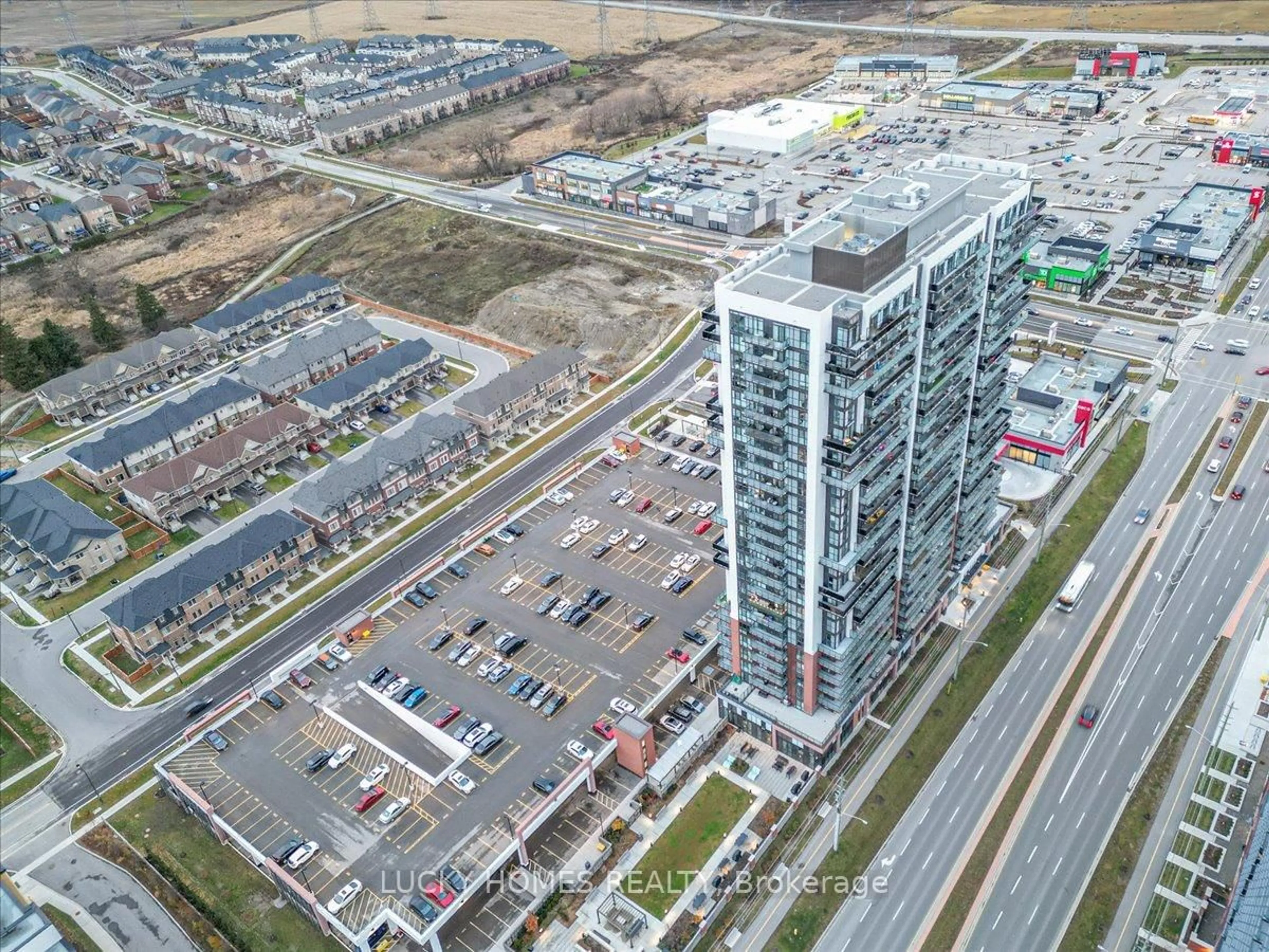 A pic from outside/outdoor area/front of a property/back of a property/a pic from drone, unknown for 2550 Simcoe St #317, Oshawa Ontario L1L 0R5