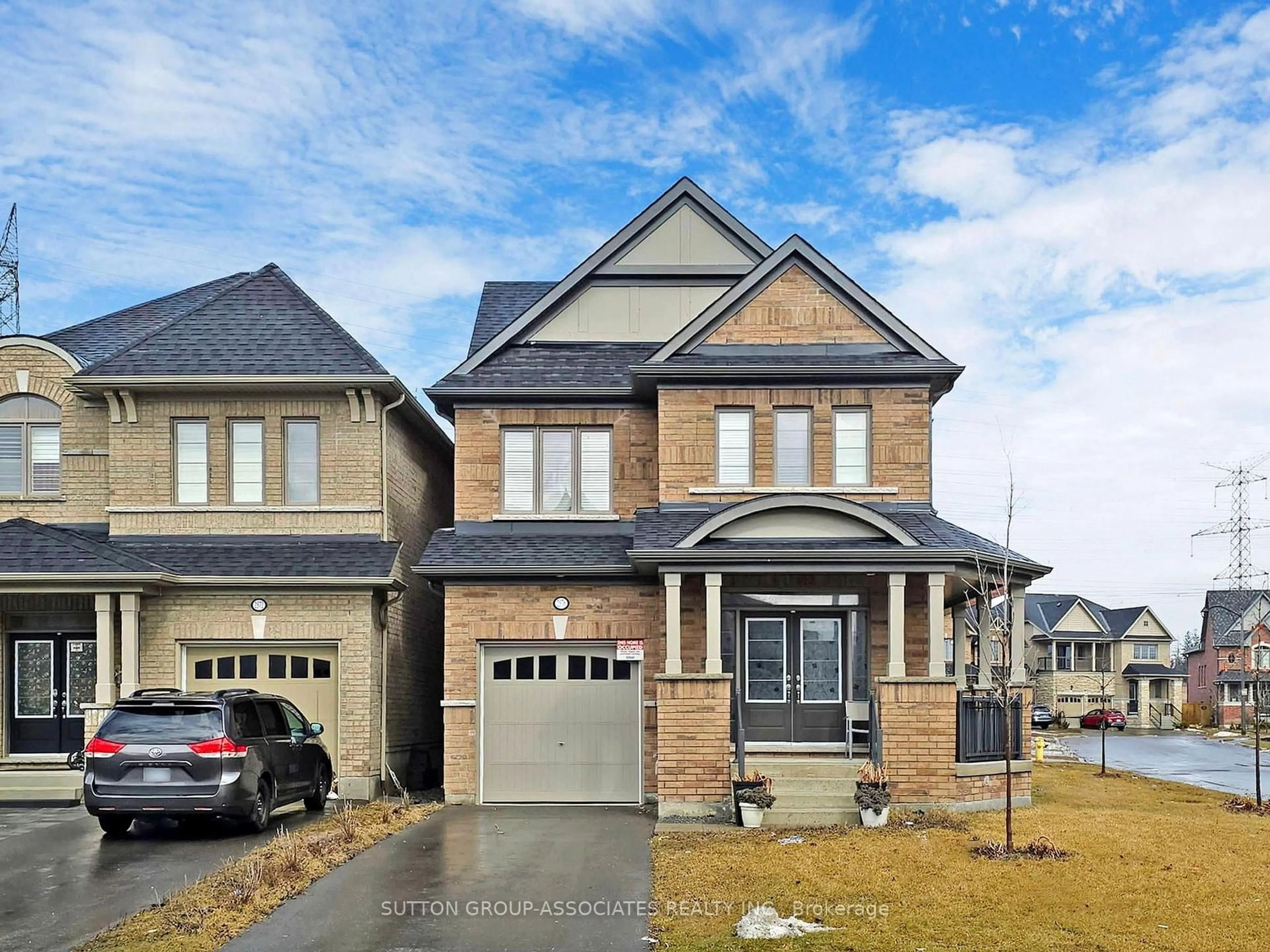 Home with brick exterior material, street for 2576 Orchestrate Dr, Oshawa Ontario L1L 0R4