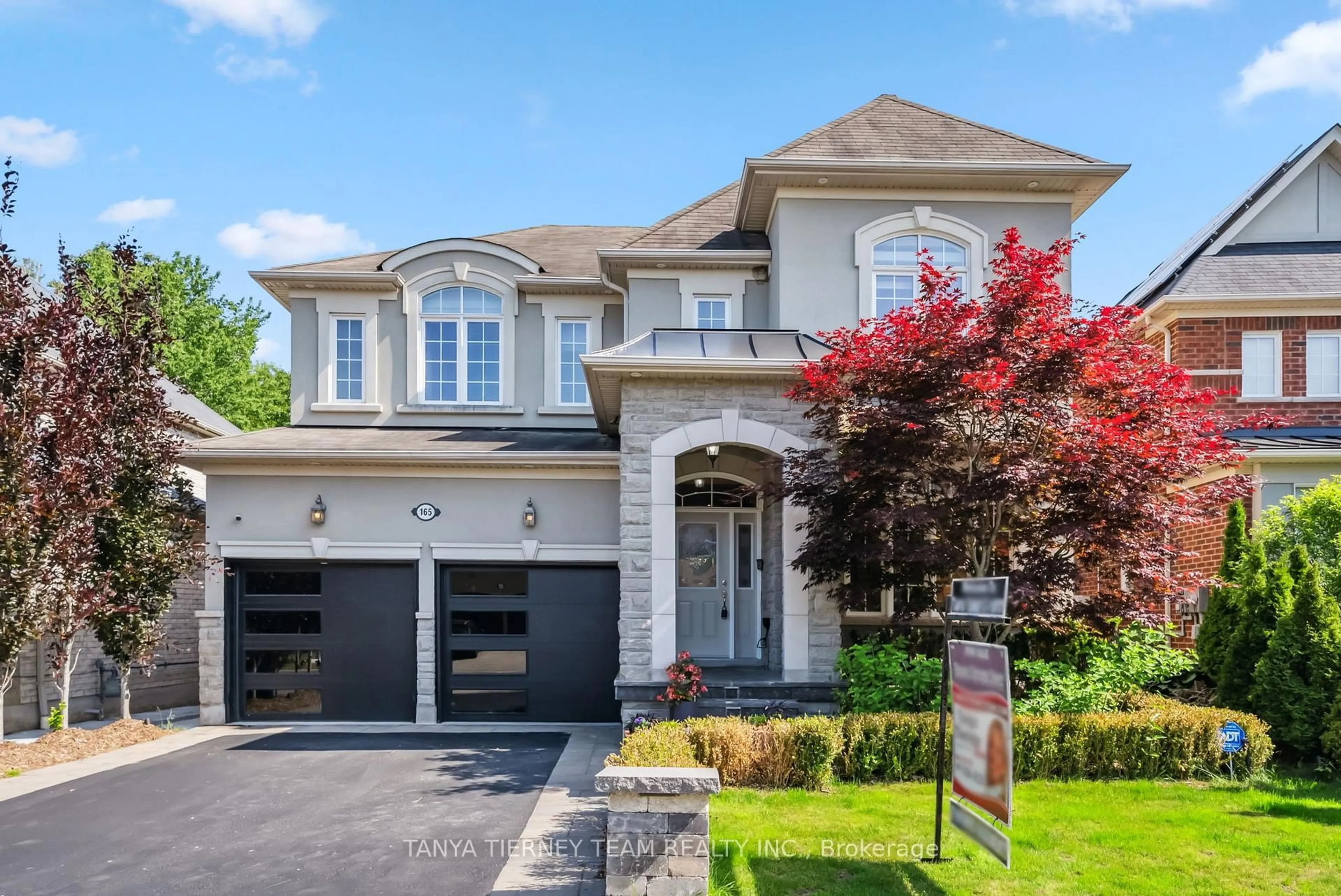 Home with brick exterior material, street for 165 Rivers Edge Pl, Whitby Ontario L1R 0G4