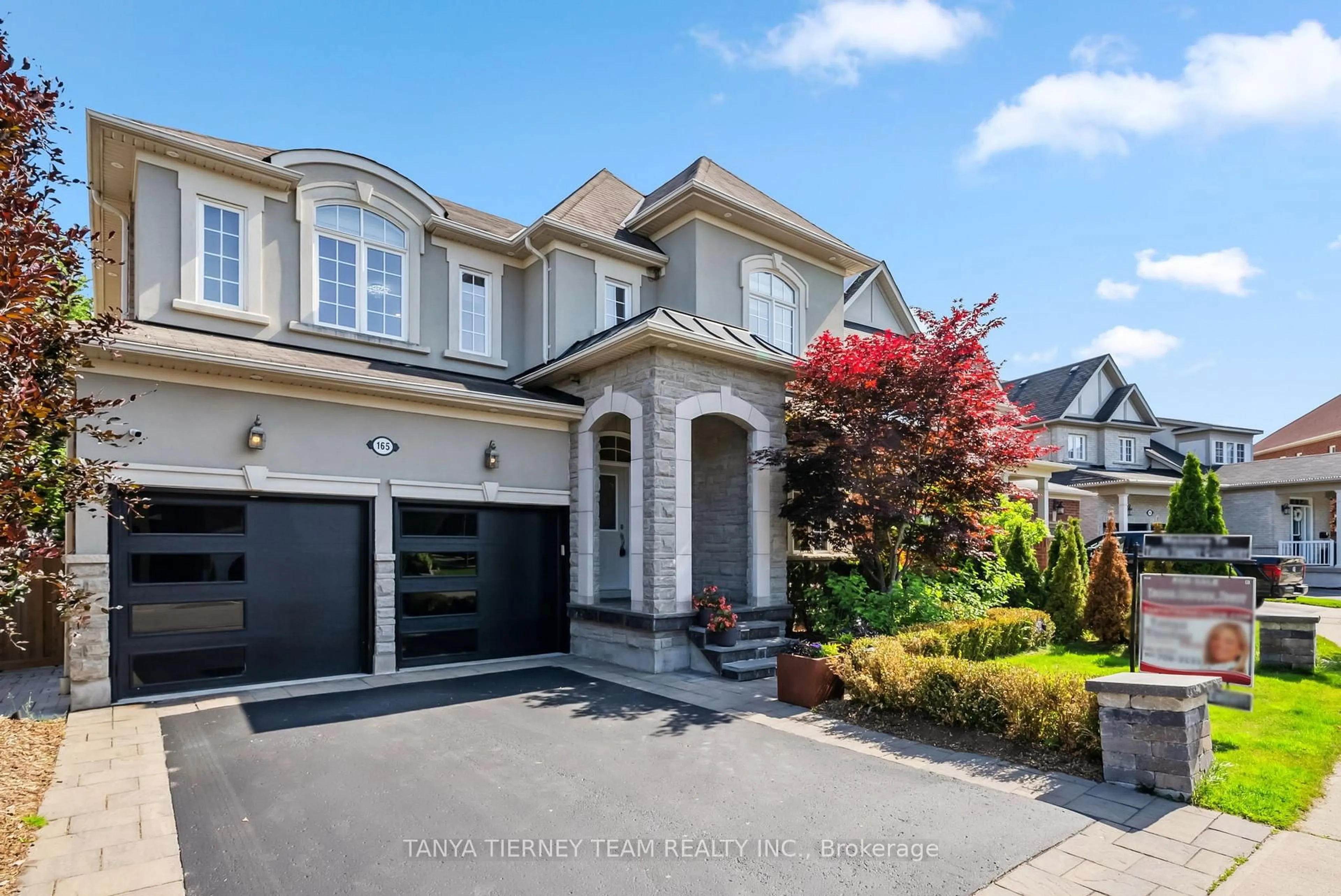 Home with brick exterior material, street for 165 Rivers Edge Pl, Whitby Ontario L1R 0G4