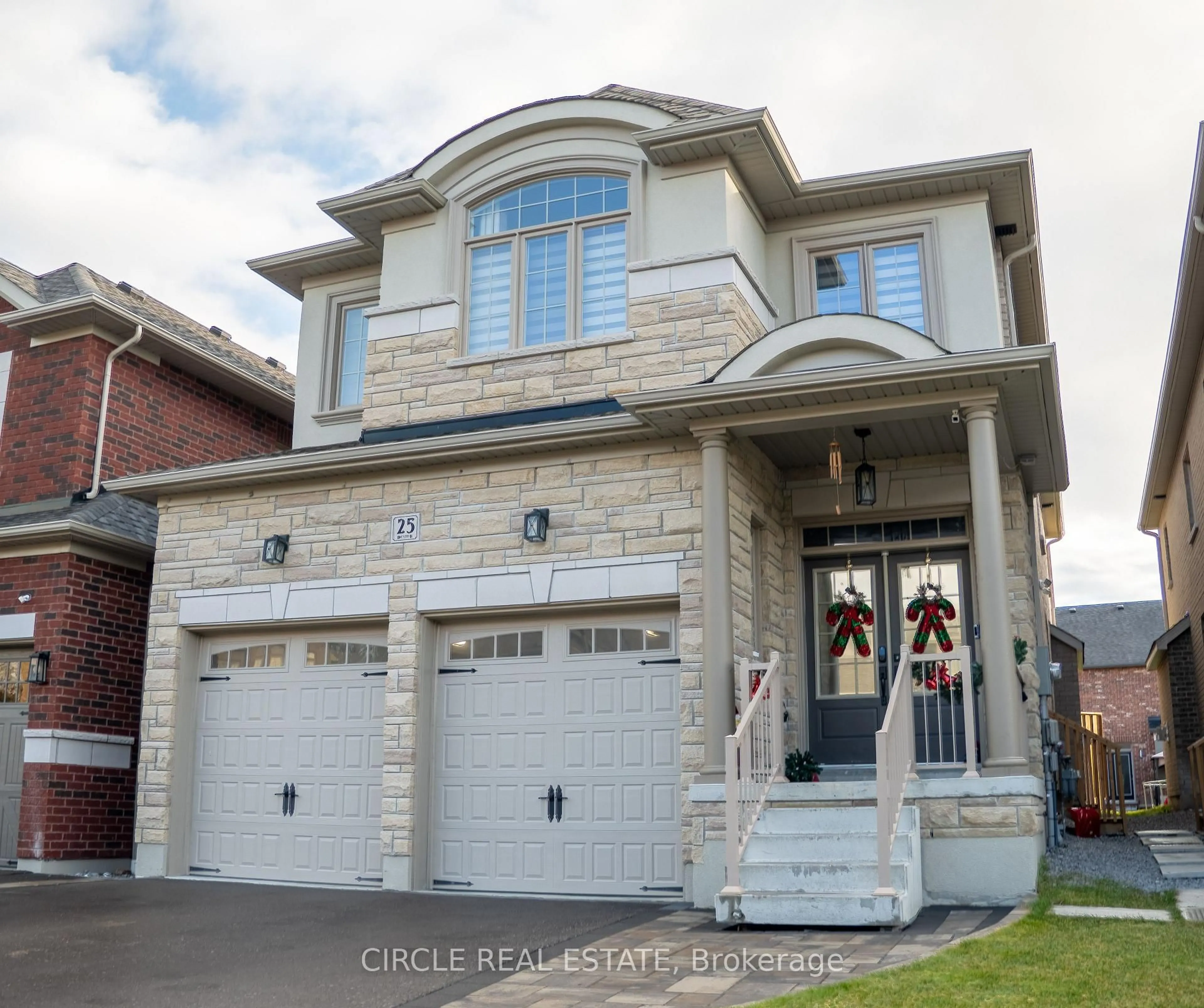 Home with brick exterior material, street for 25 Ouellette Dr, Whitby Ontario L1P 0E3