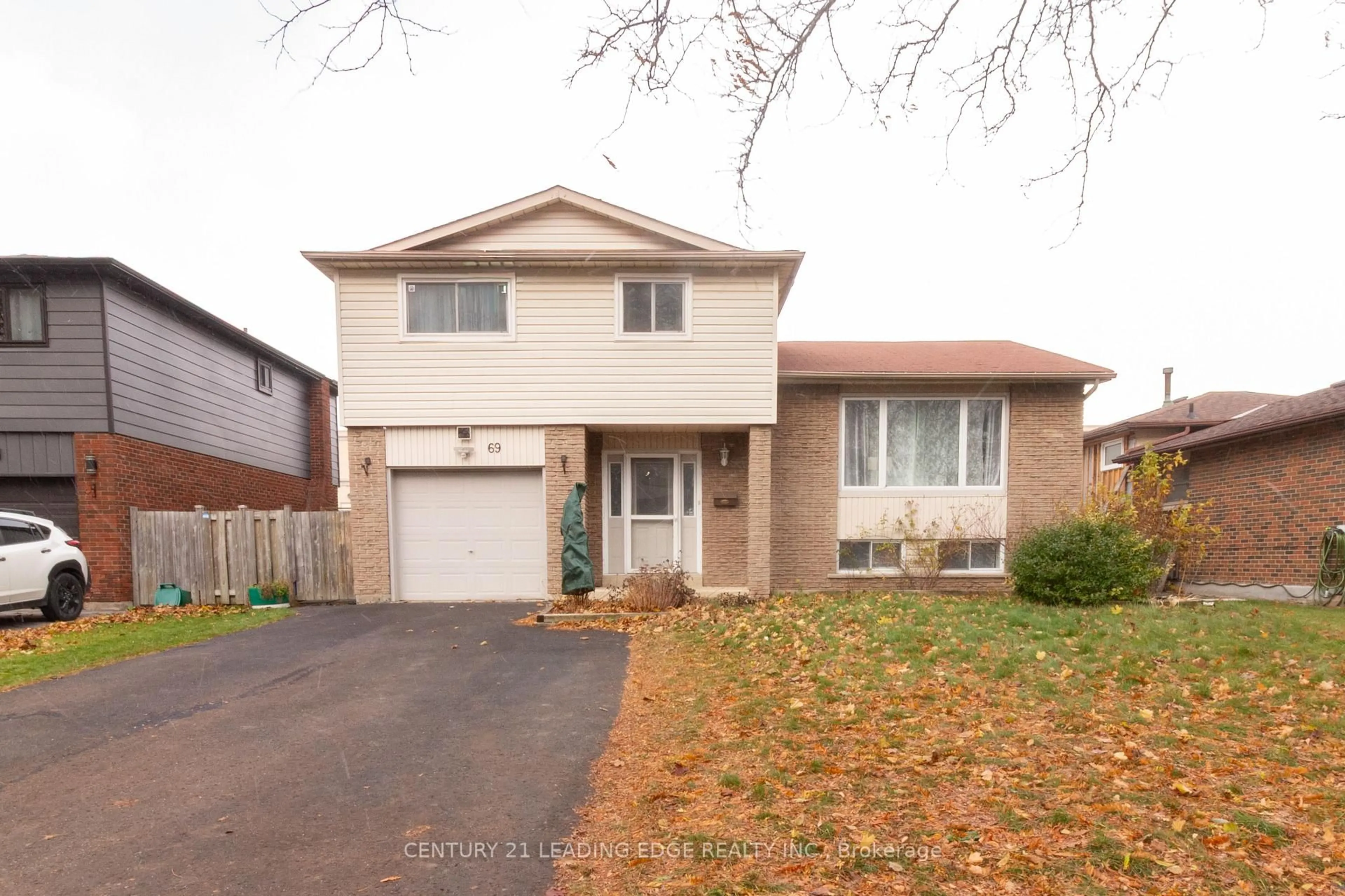 Home with vinyl exterior material, street for 69 Calais St, Whitby Ontario L1N 5M3