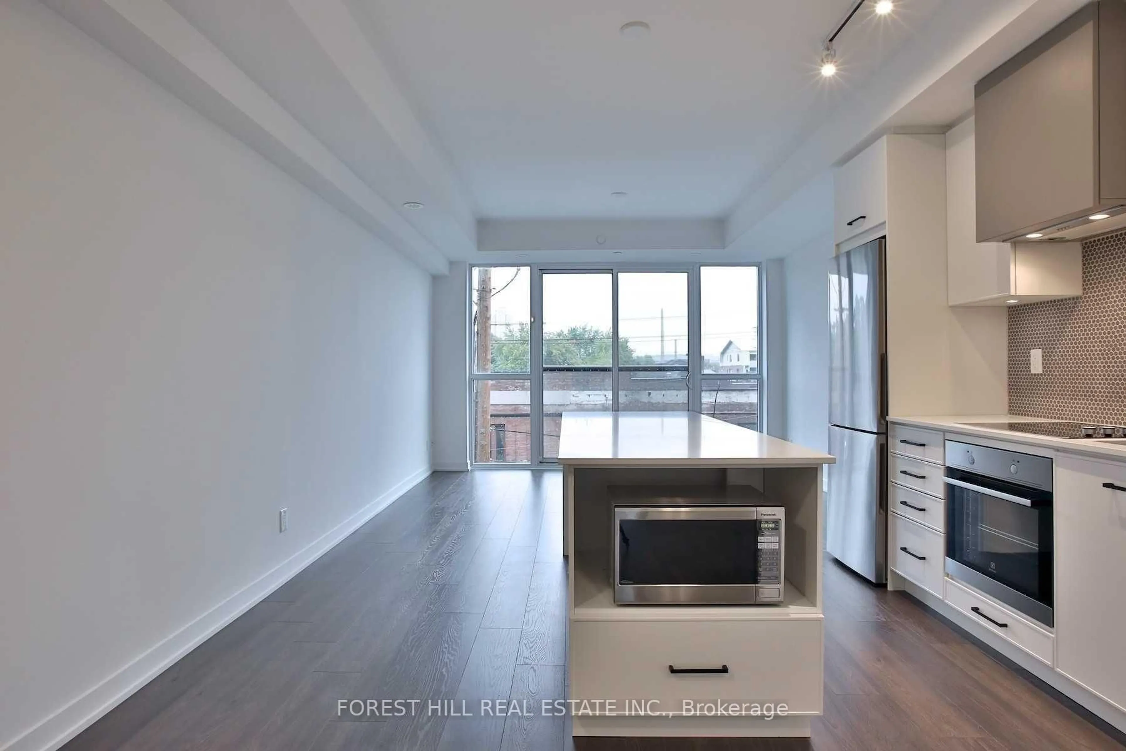 Open concept kitchen, unknown for 899 Queen St #402, Toronto Ontario M4M 1J4