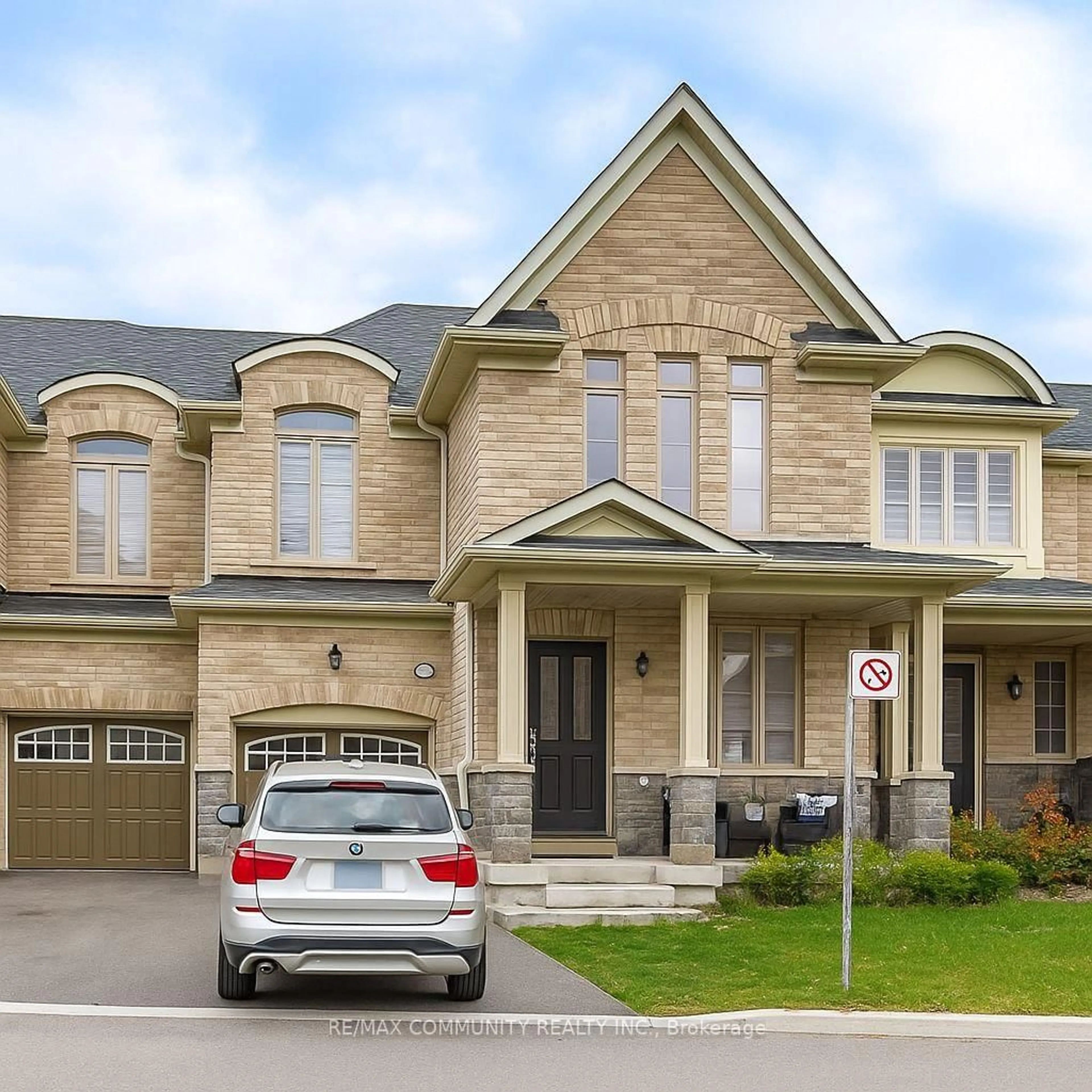Home with brick exterior material, street for 49 Hickling Lane, Ajax Ontario L1T 0P9