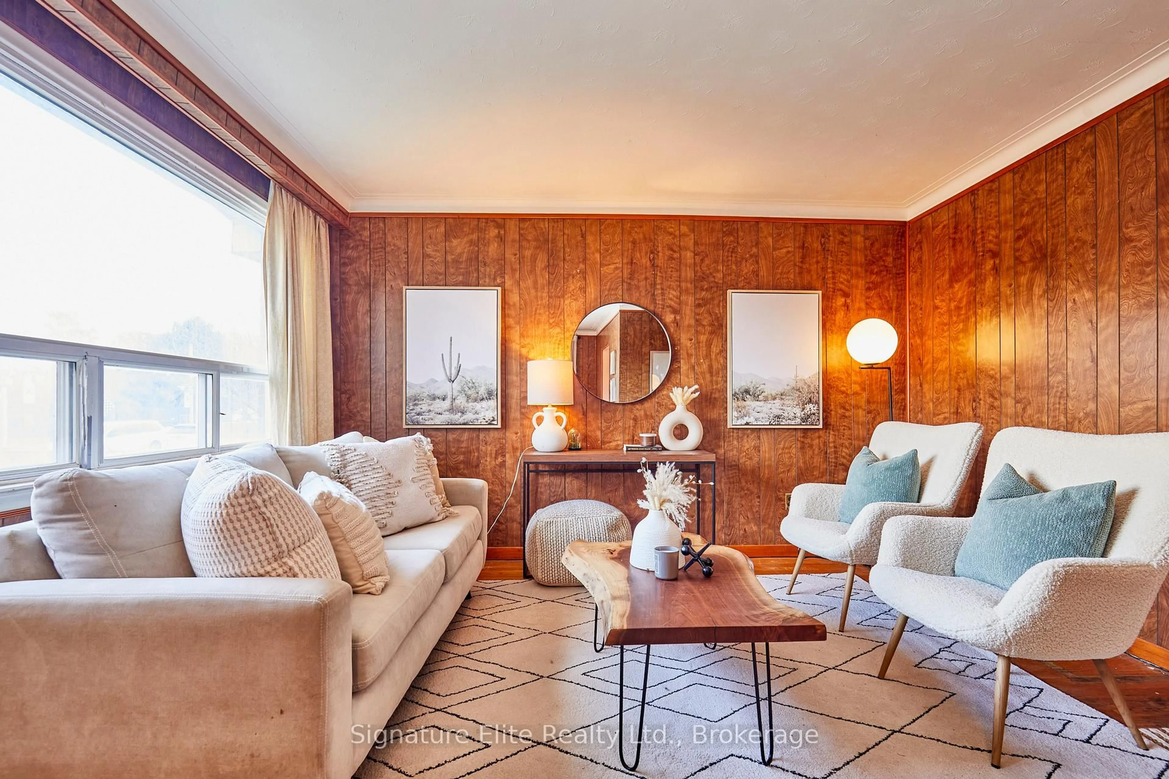 Living room with furniture, wood/laminate floor for 49 Savarin St, Toronto Ontario M1J 1Z9