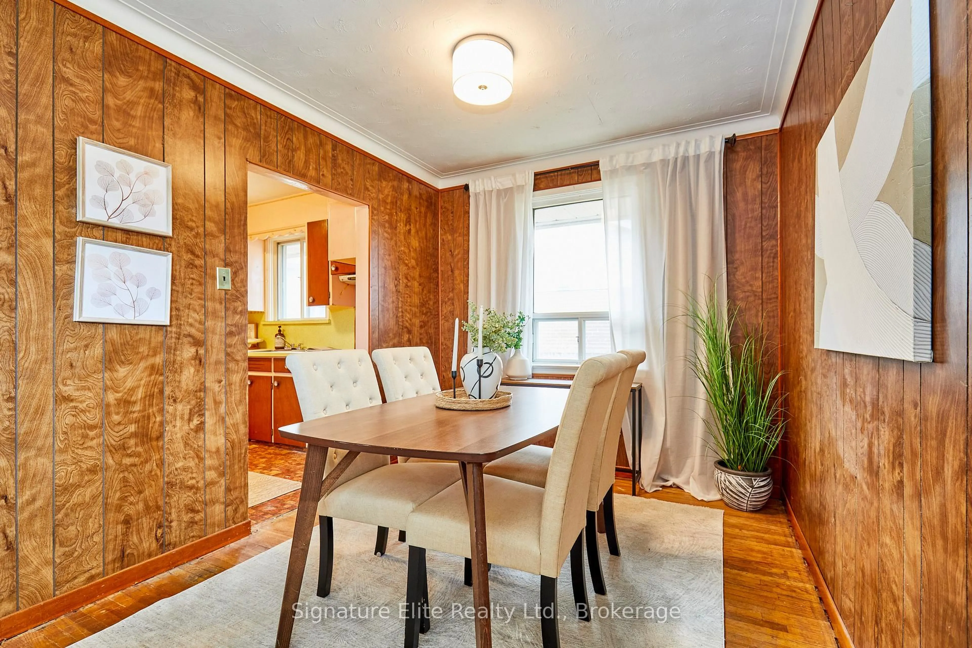 Dining room, wood/laminate floor for 49 Savarin St, Toronto Ontario M1J 1Z9