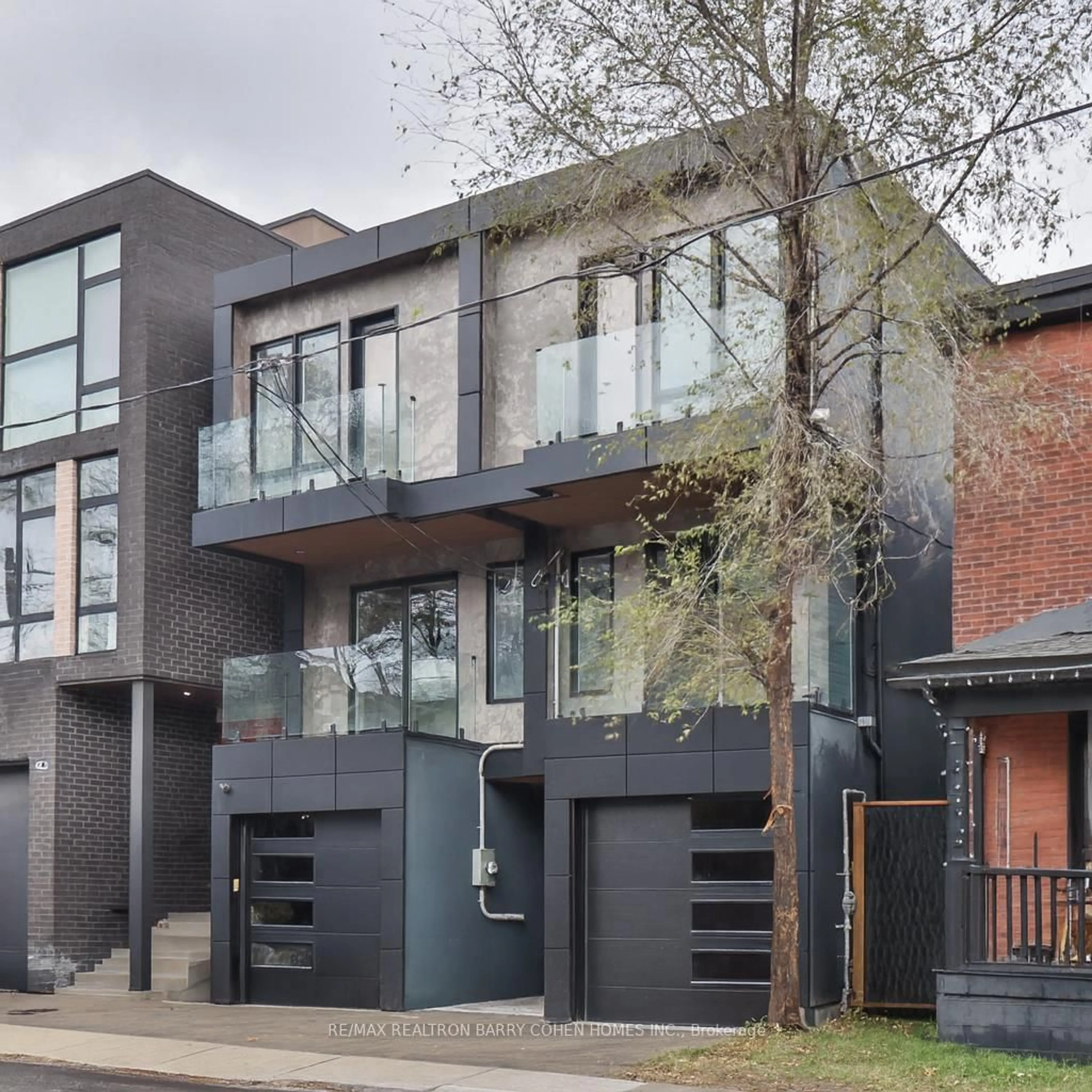 Home with brick exterior material, street for 57 Jones Ave Ave, Toronto Ontario M4M 2Z7