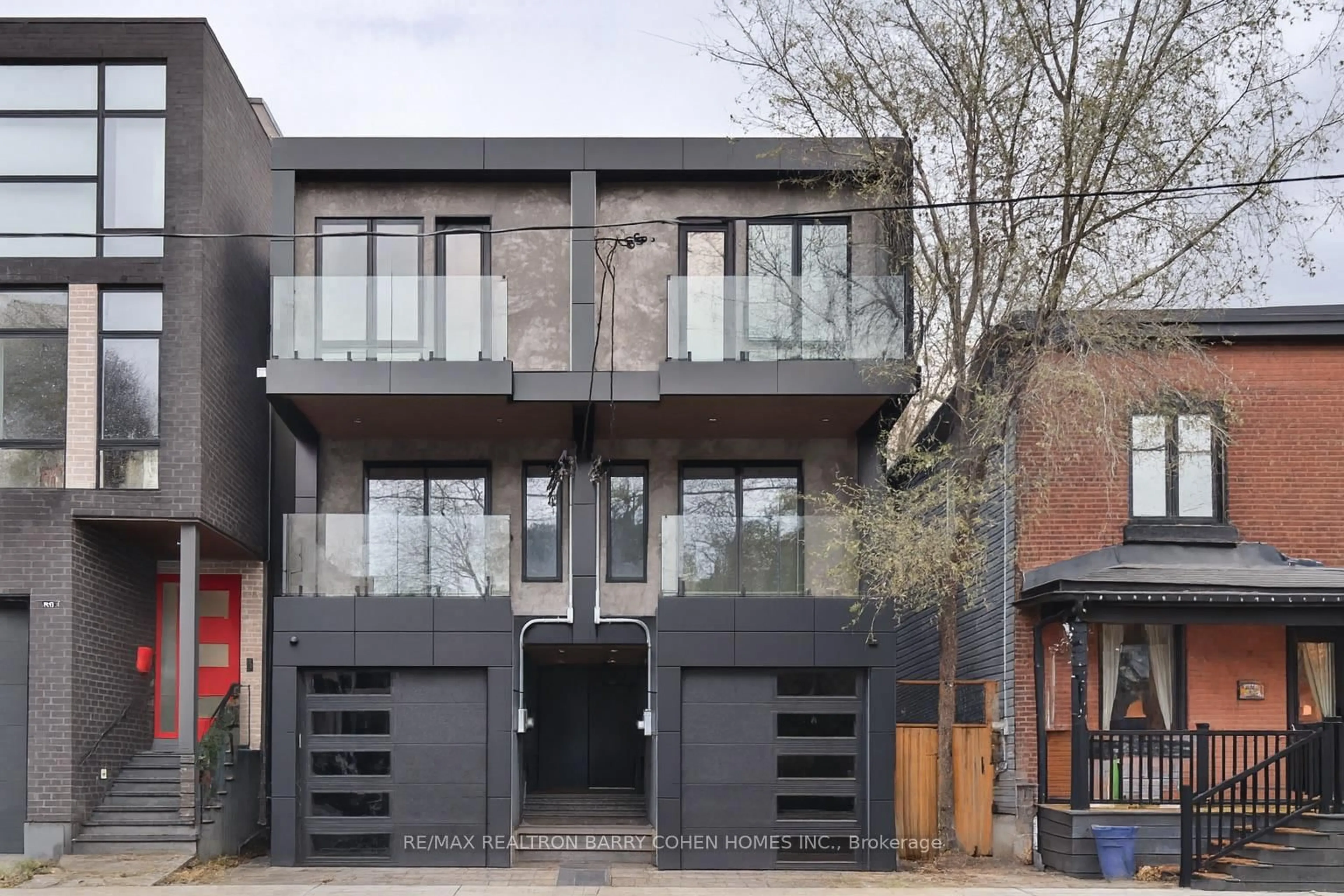 Home with brick exterior material, street for 57 Jones Ave Ave, Toronto Ontario M4M 2Z7