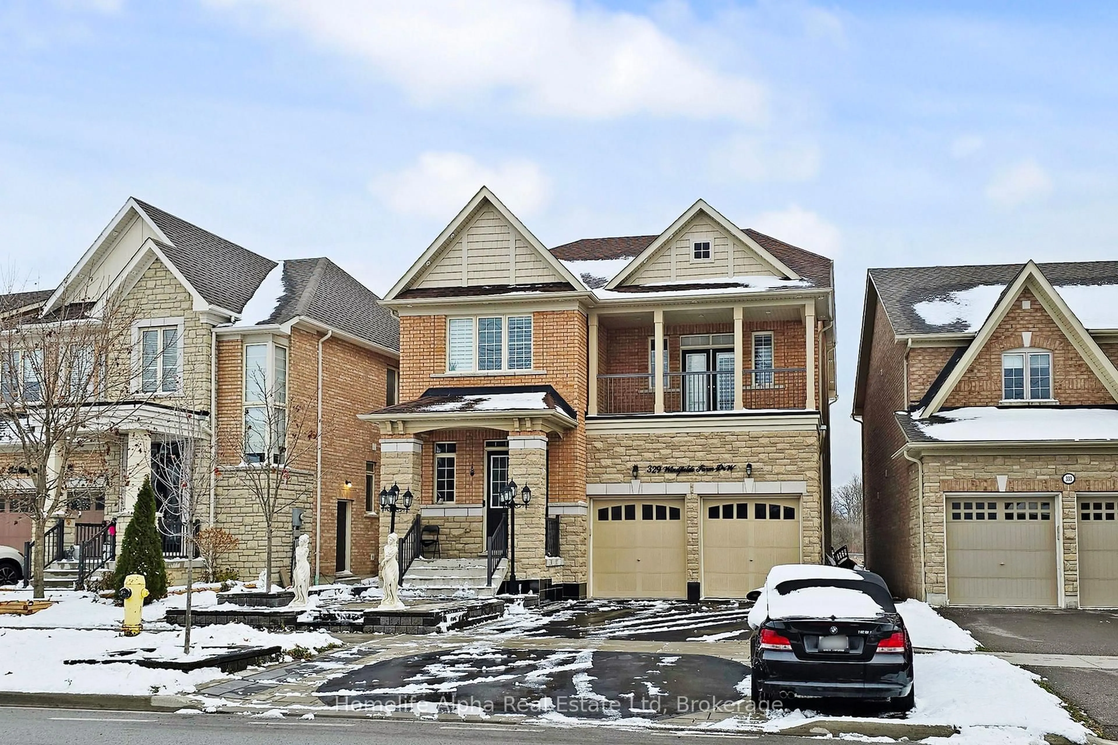 Home with brick exterior material, street for 329 Windfields Farm Dr, Oshawa Ontario L1L 0M2