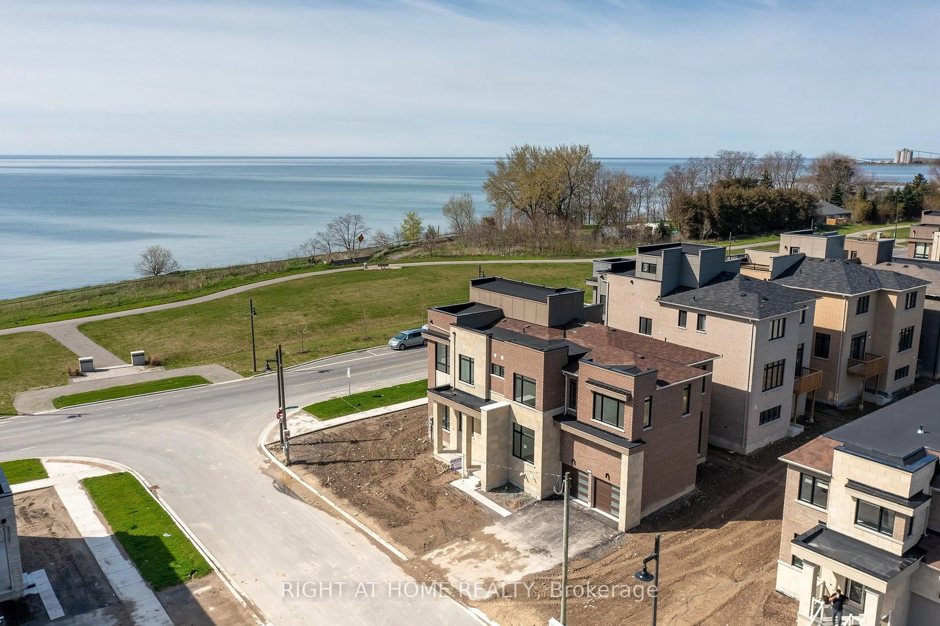 A pic from outside/outdoor area/front of a property/back of a property/a pic from drone, water/lake/river/ocean view for 2 Yacht Dr, Clarington Ontario L1C 4B1