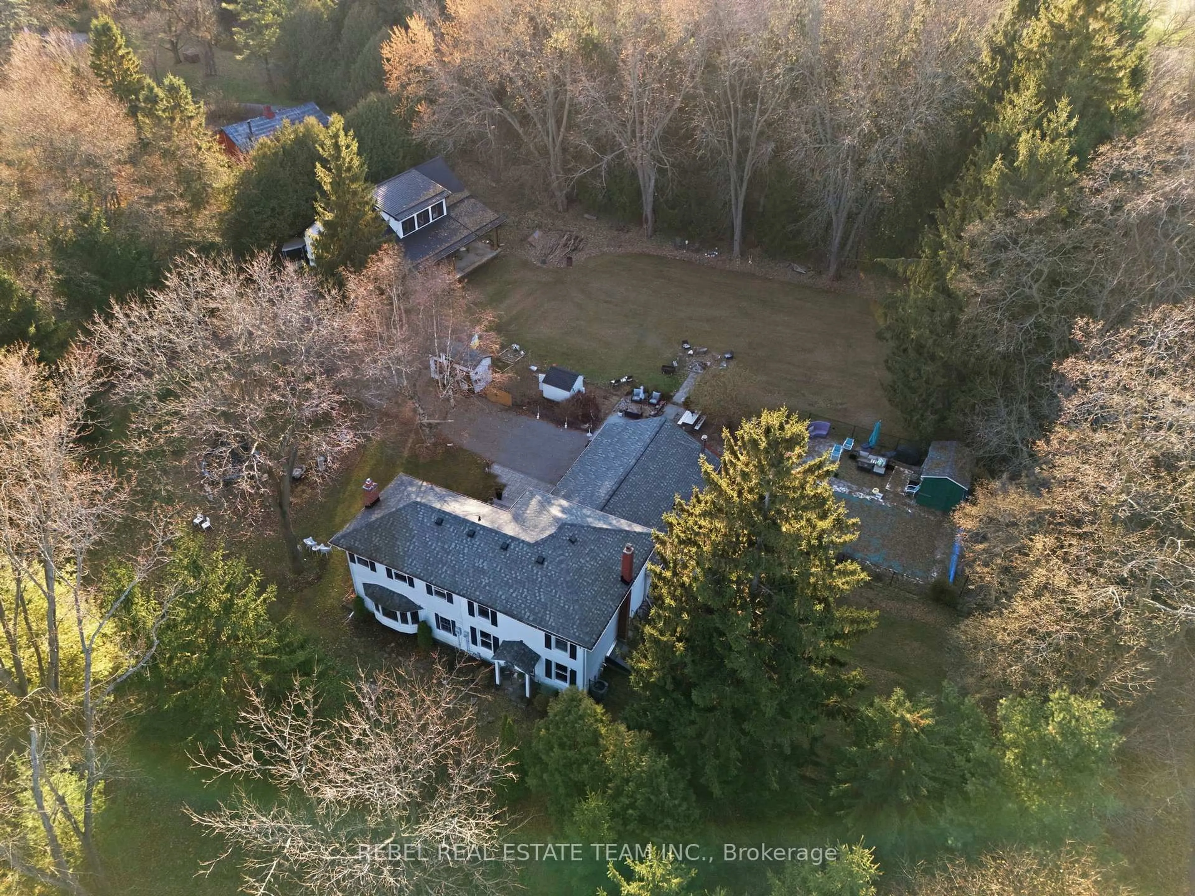 A pic from outside/outdoor area/front of a property/back of a property/a pic from drone, forest/trees view for 5462 Main St, Clarington Ontario L0B 1M0