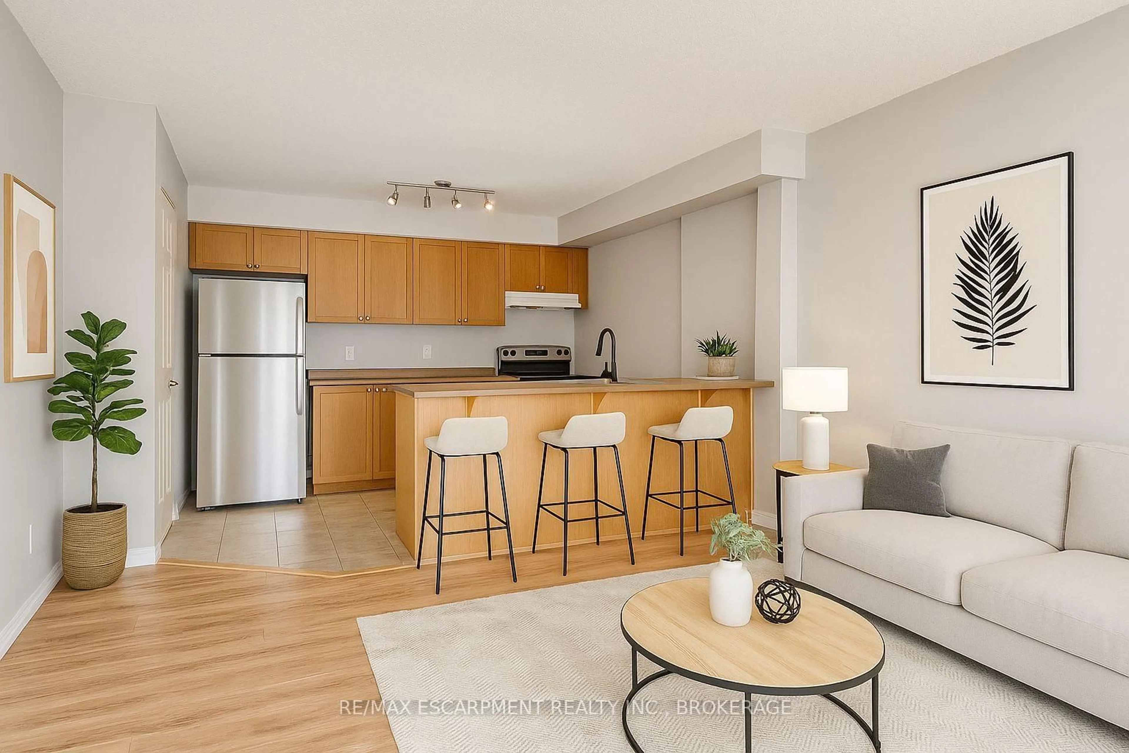 Open concept kitchen, wood/laminate floor for 75 Shipway Ave #209, Clarington Ontario L1B 0B6