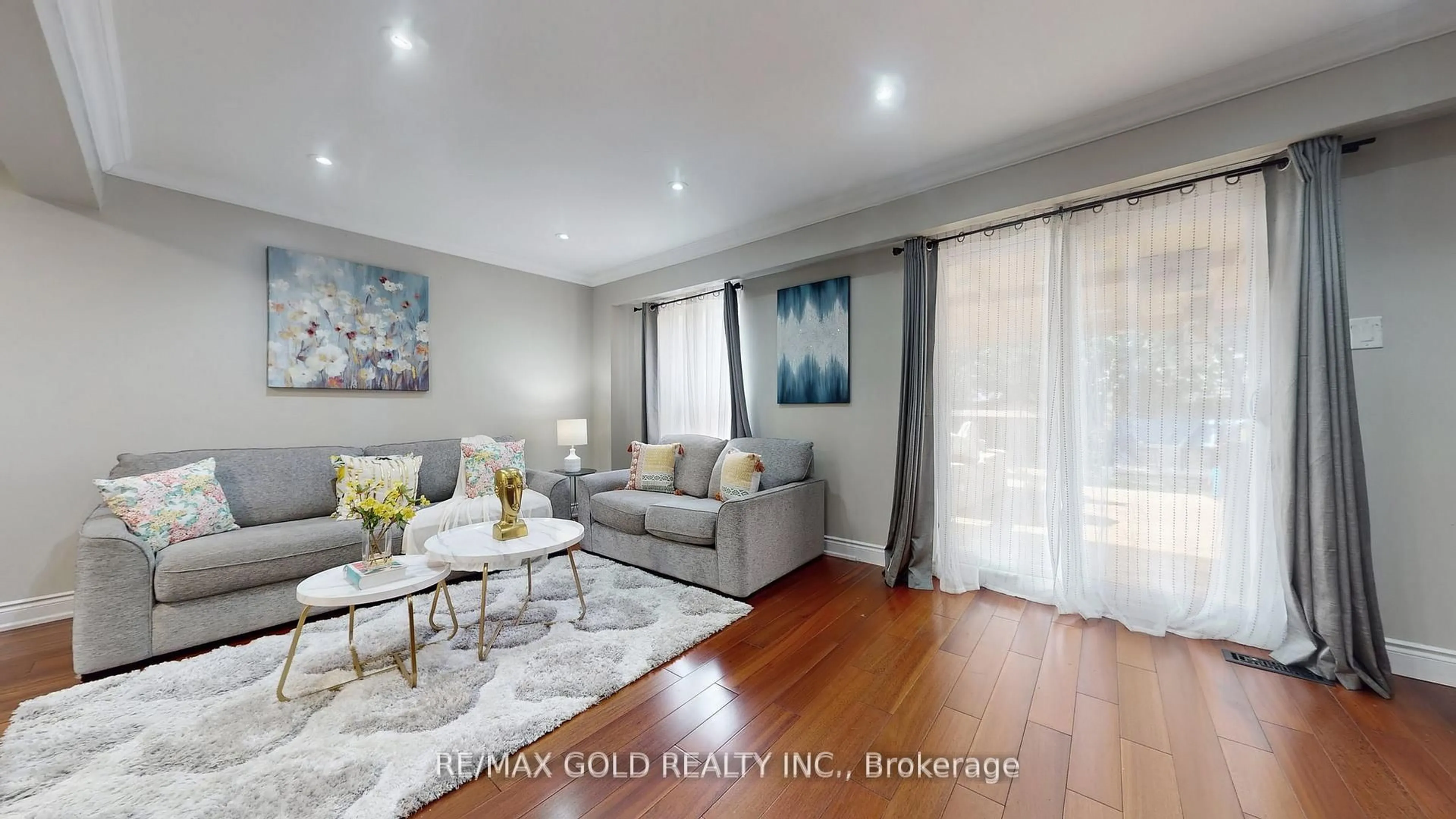 Living room with furniture, wood/laminate floor for 42 Murison Blvd, Toronto Ontario M1B 2B2