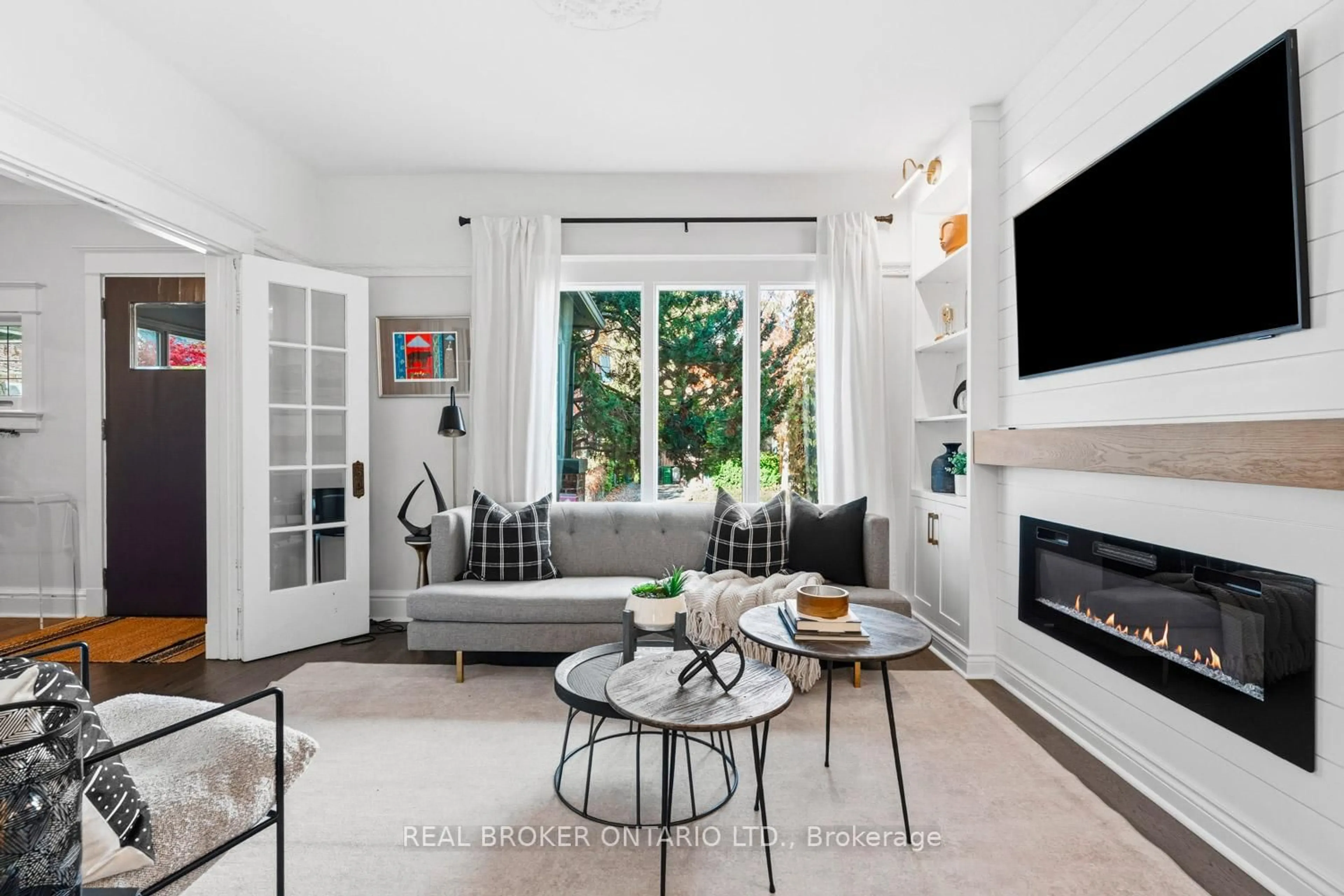 Living room with furniture, ceramic/tile floor for 7 Juniper Ave, Toronto Ontario M4L 1S1