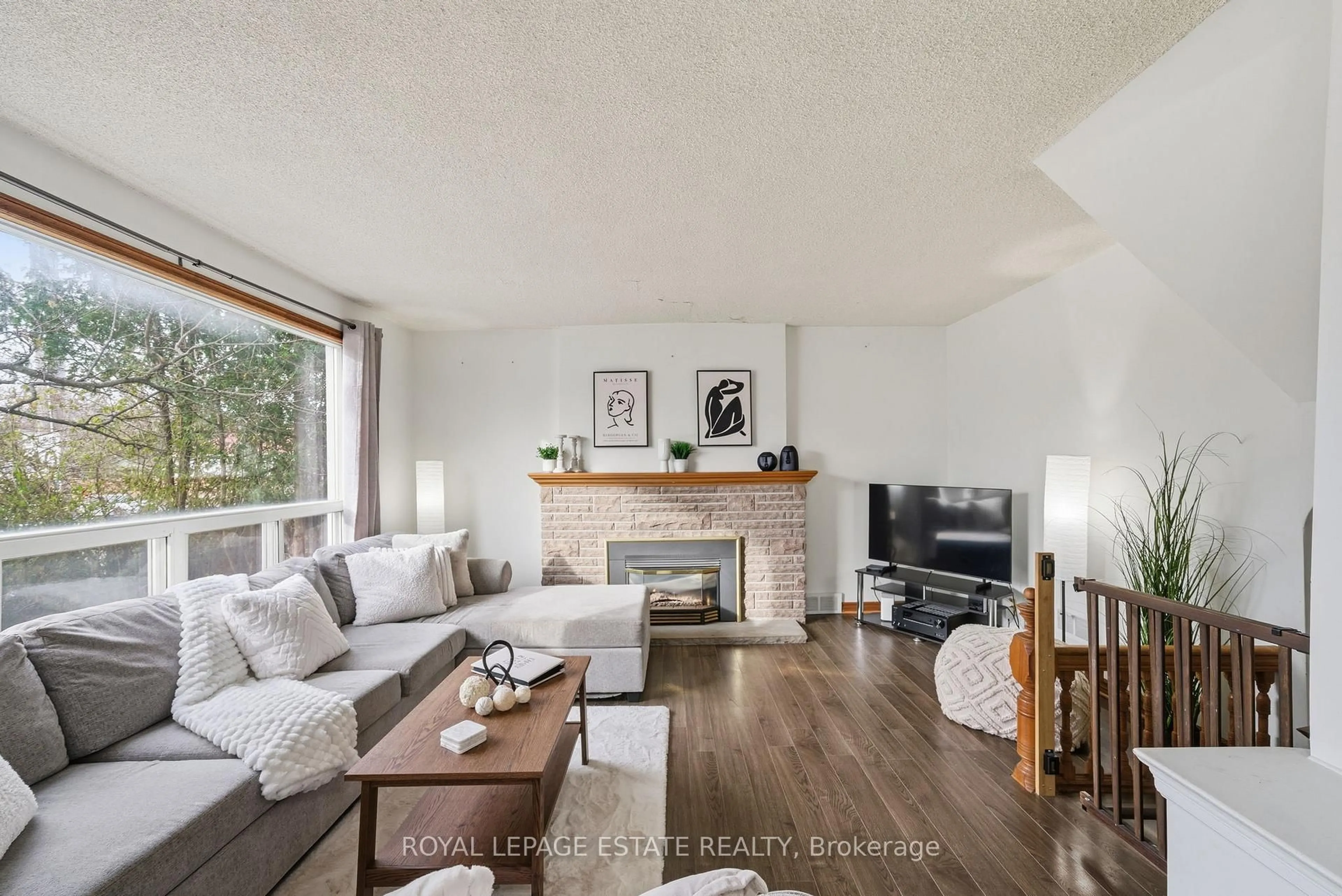 Living room with furniture, wood/laminate floor for 349 Oshawa Blvd, Oshawa Ontario L1H 5S3