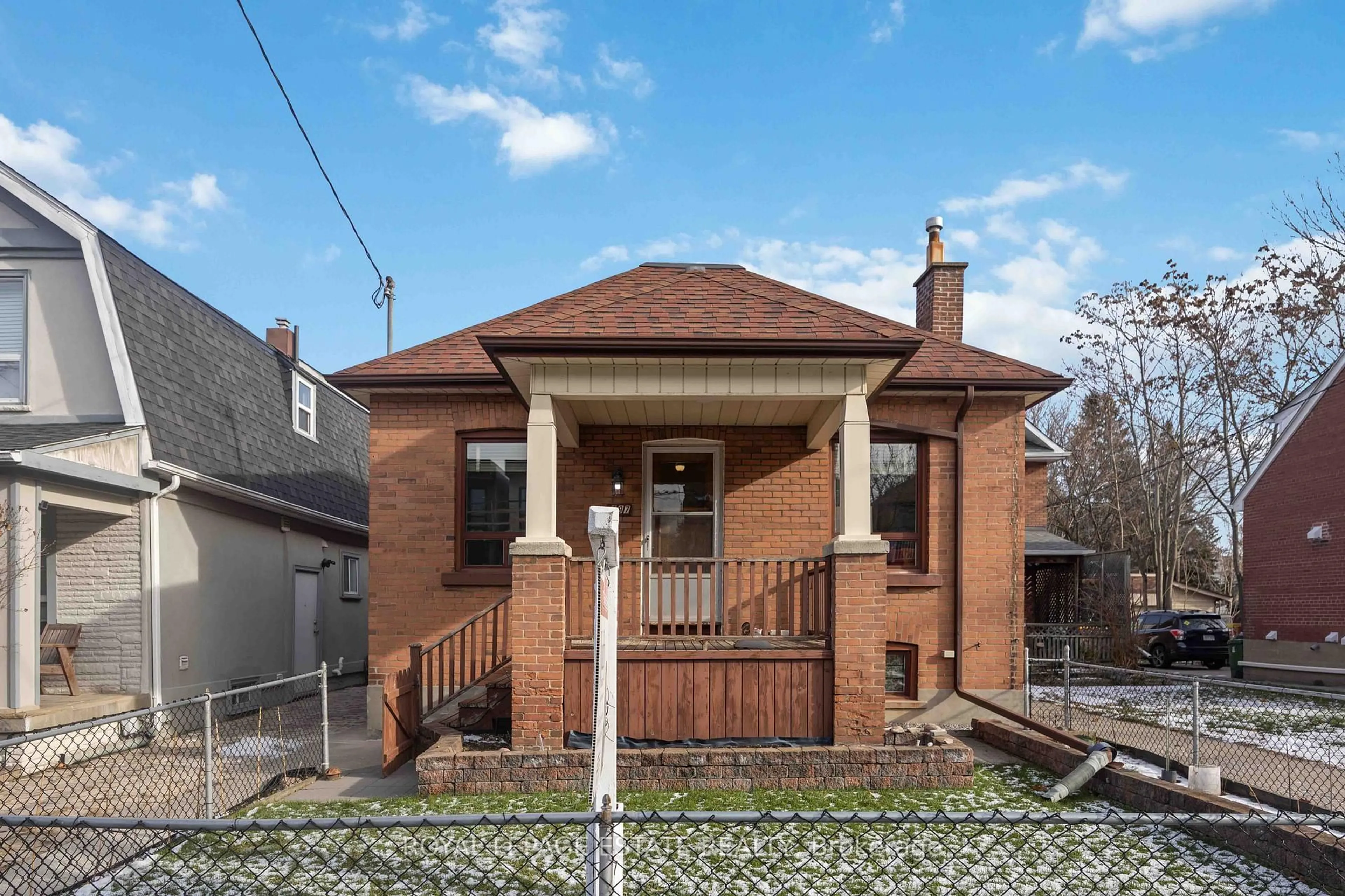 Home with brick exterior material, street for 297 Cedarvale Ave, Toronto Ontario M4C 4K3