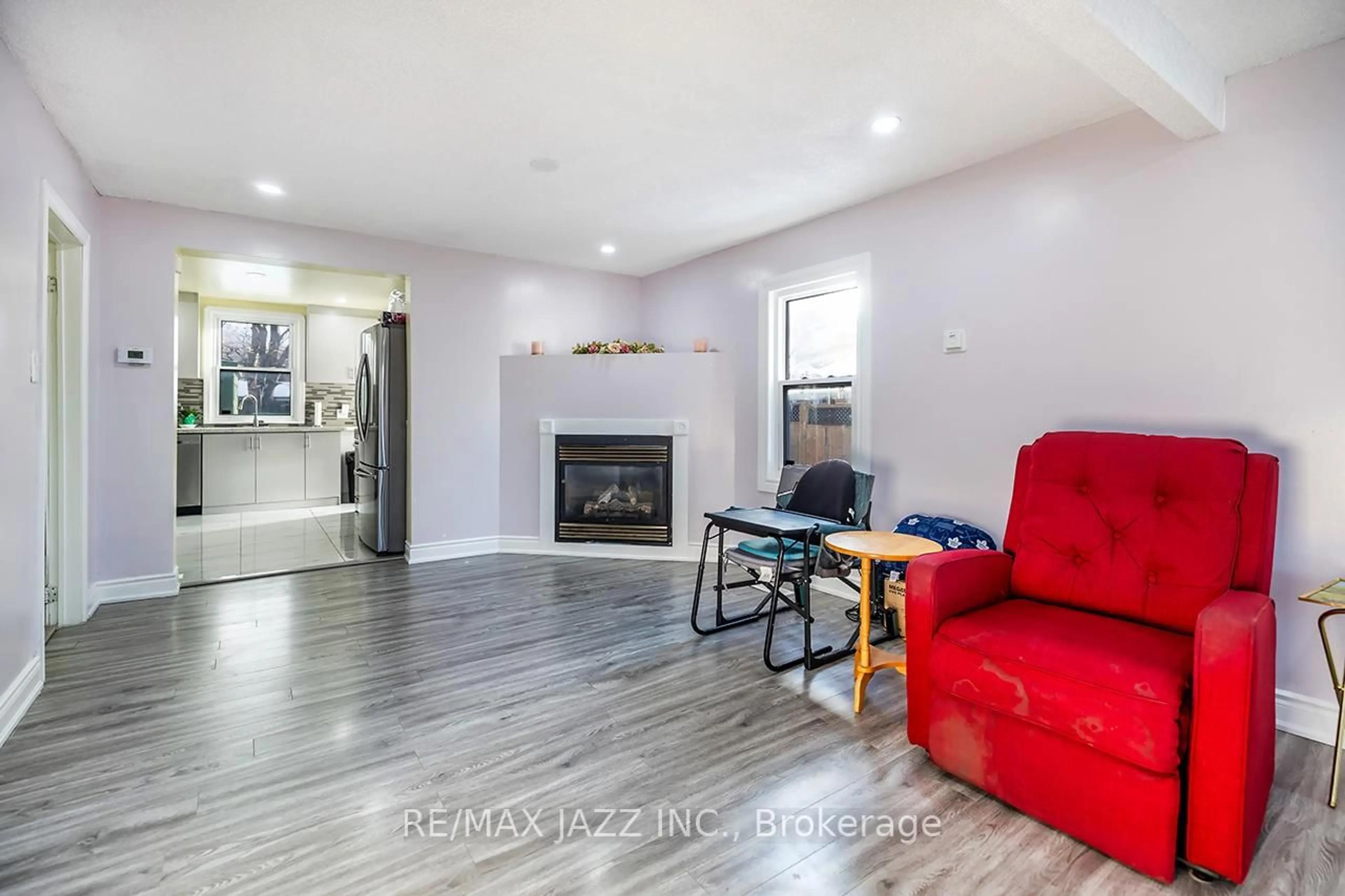 Living room with furniture, wood/laminate floor for 183 Conant St, Oshawa Ontario L1H 3R9