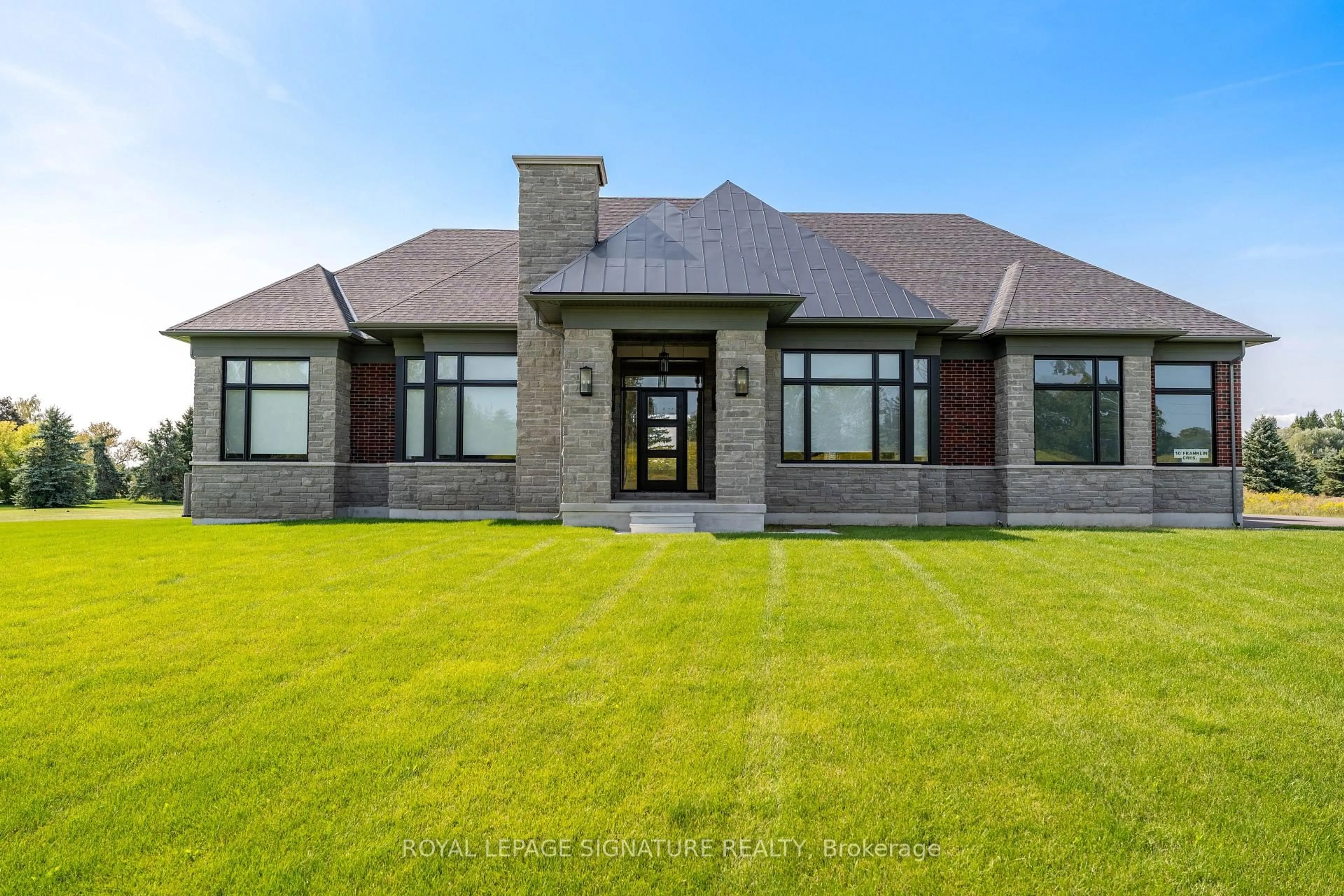 Home with brick exterior material, unknown for 10 Franklin Cres, Whitby Ontario L0B 1A0