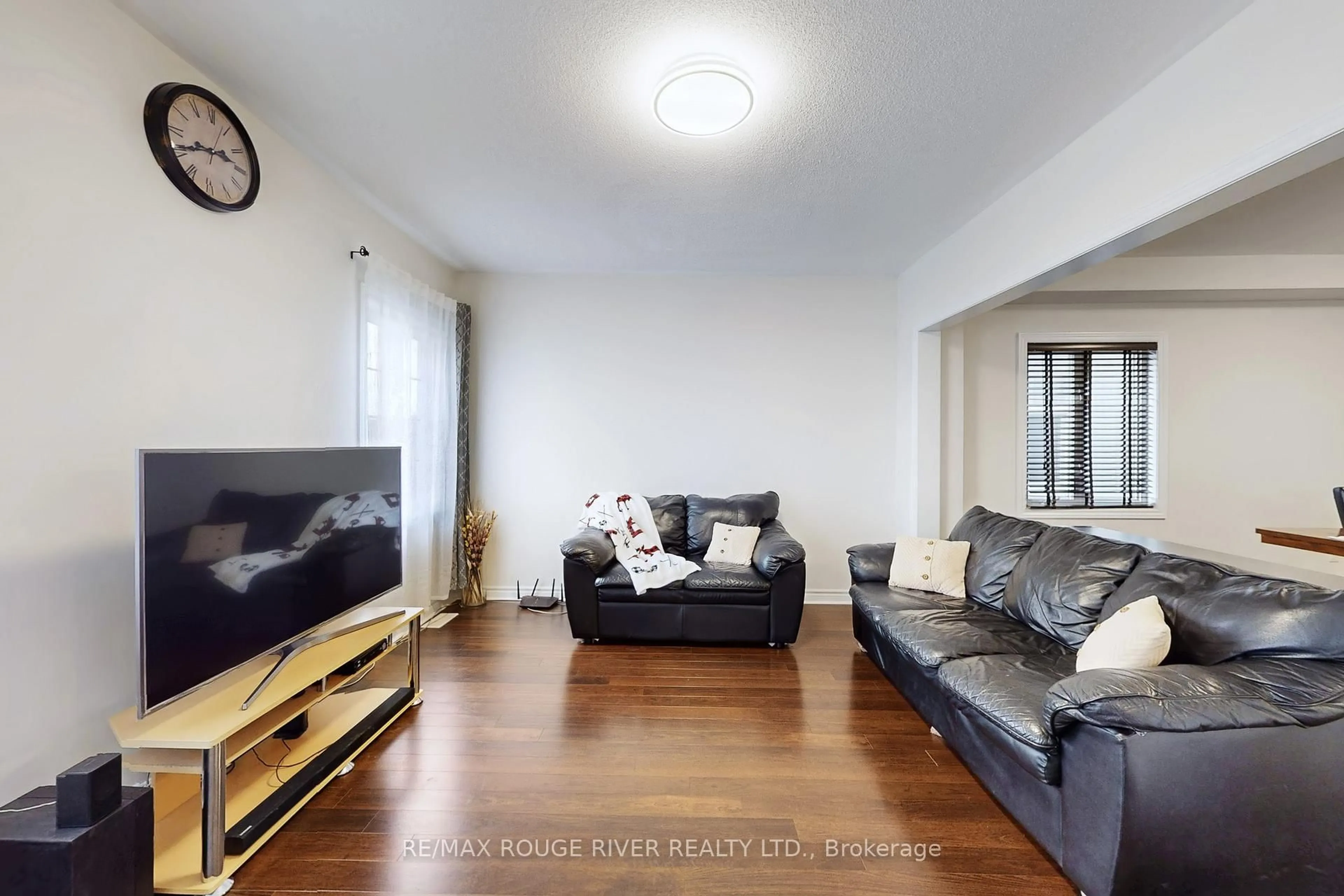 Living room with furniture, unknown for 15 Adanac Dr, Whitby Ontario L1N 0J4