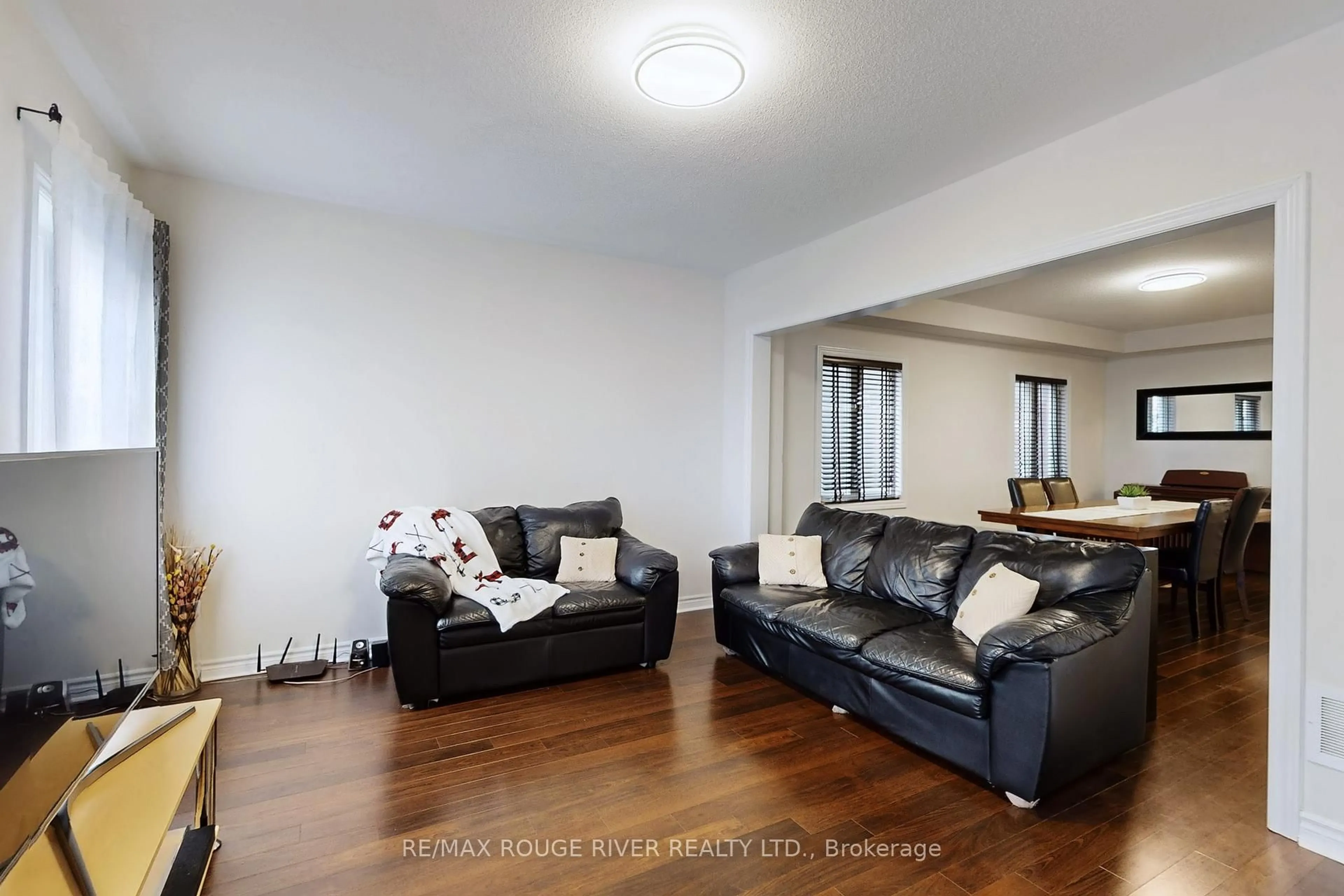 Living room with furniture, unknown for 15 Adanac Dr, Whitby Ontario L1N 0J4