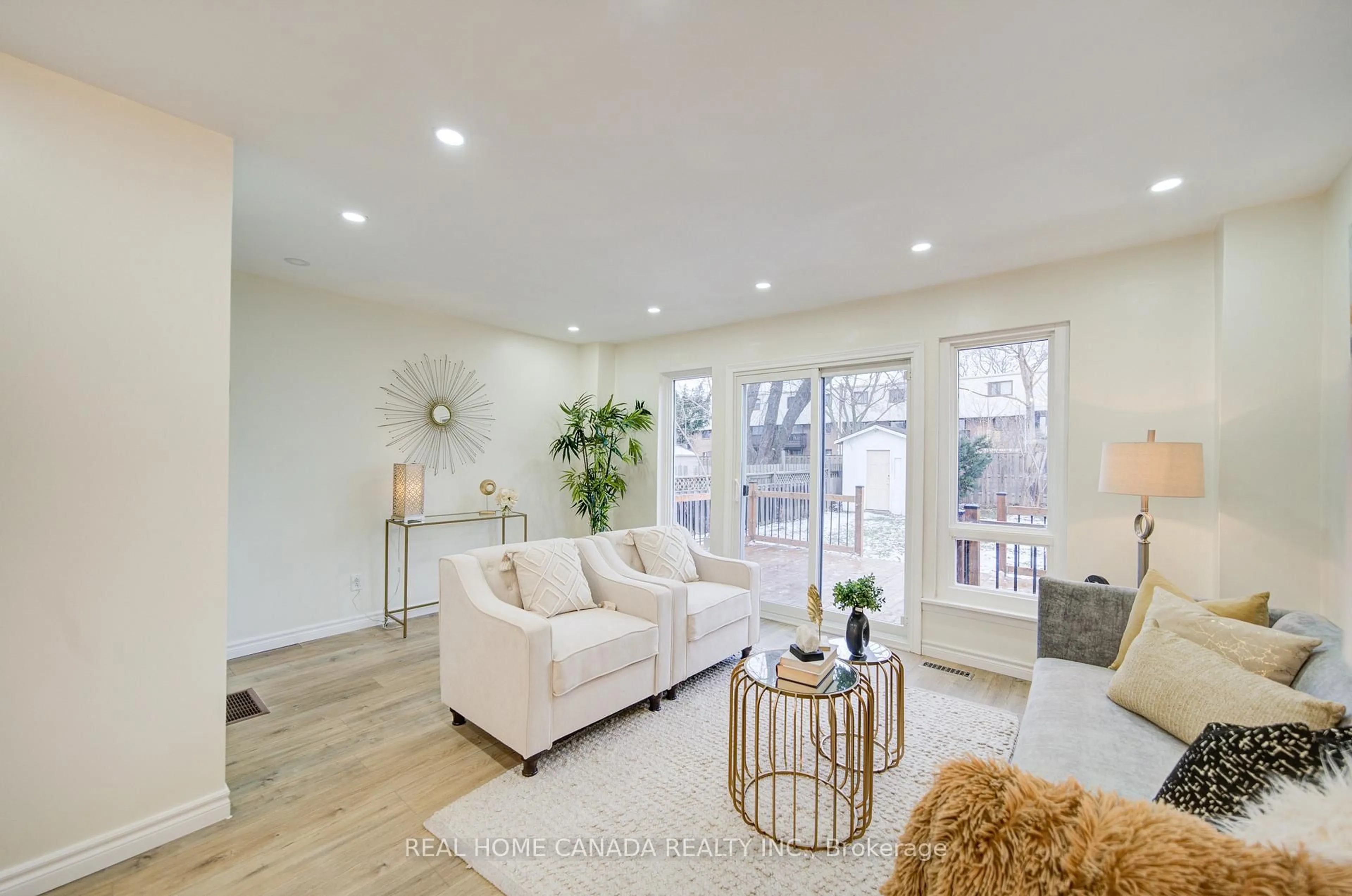 Living room with furniture, wood/laminate floor for 1088 Venus Cres, Oshawa Ontario L1J 6E4