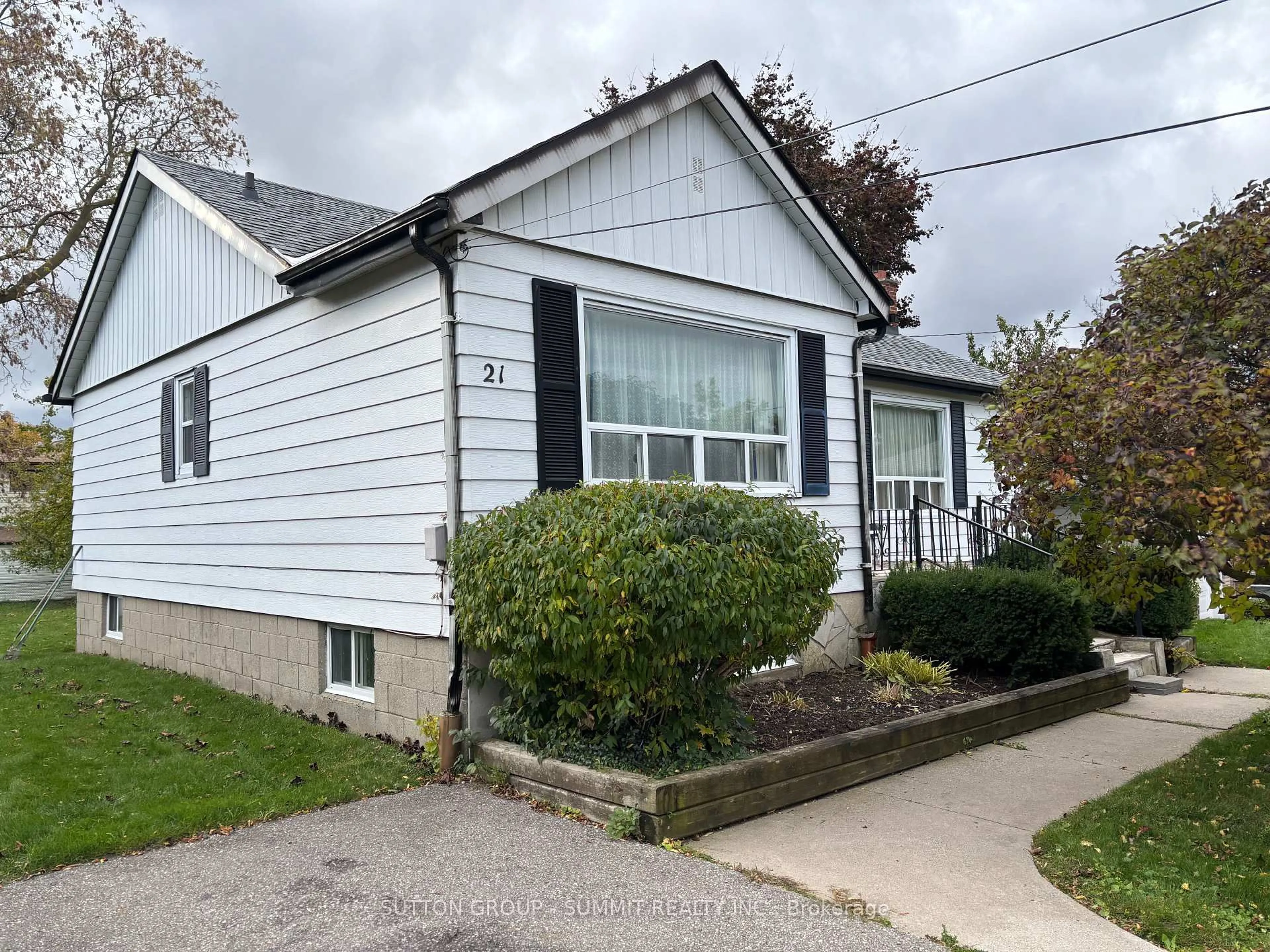 Home with vinyl exterior material, street for 21 GRACE St, Toronto Ontario M1J 2M3