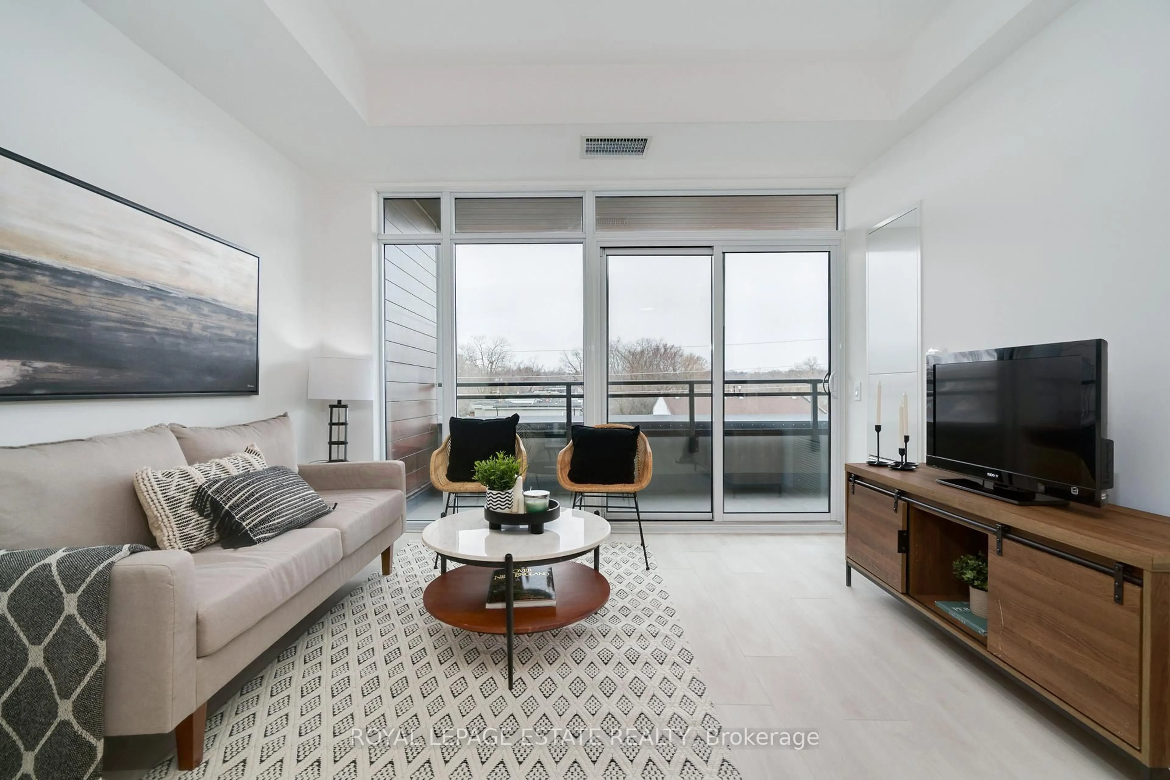 Living room with furniture, unknown for 1285 Queen St #404, Toronto Ontario M4L 0B6