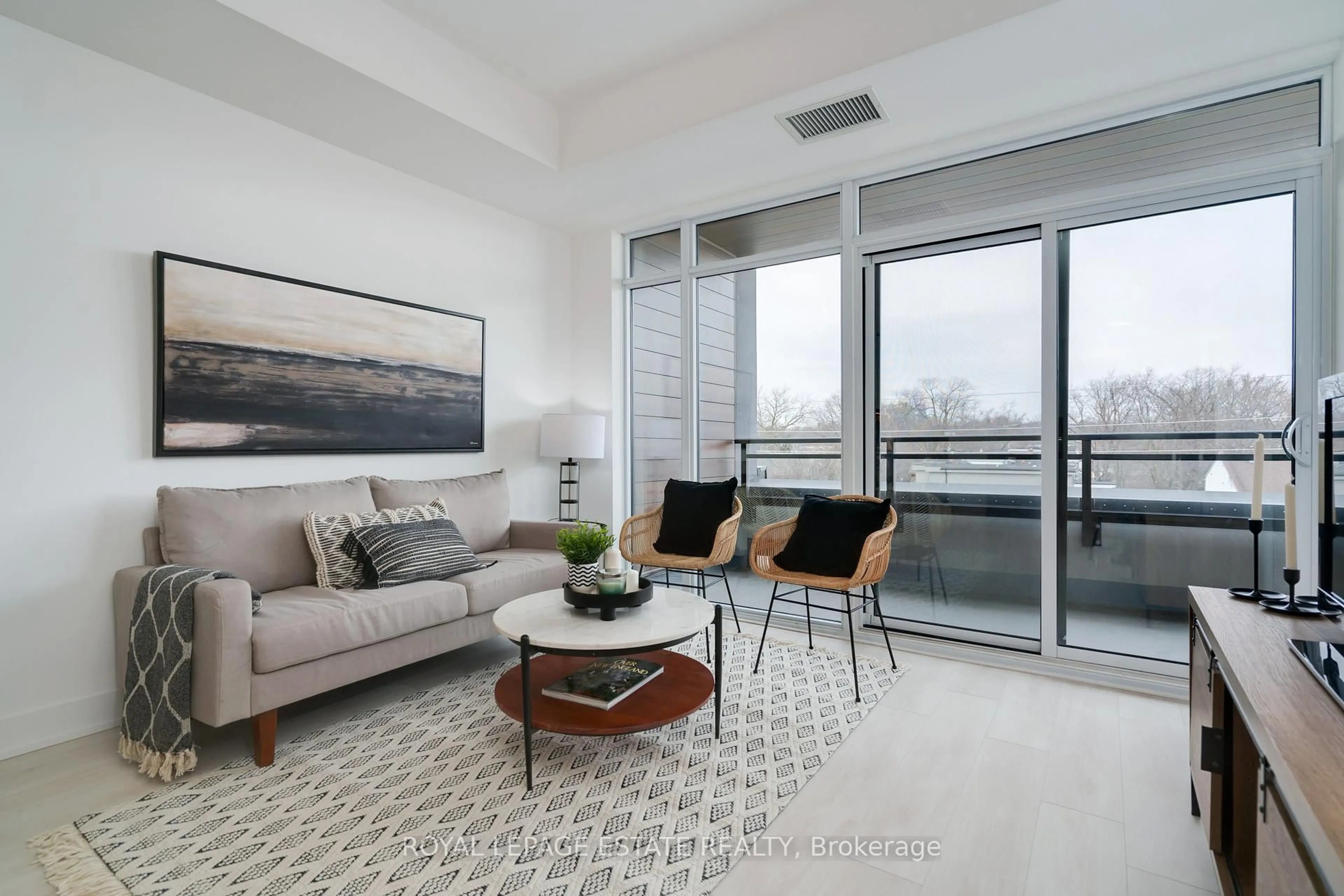 Living room with furniture, unknown for 1285 Queen St #404, Toronto Ontario M4L 0B6