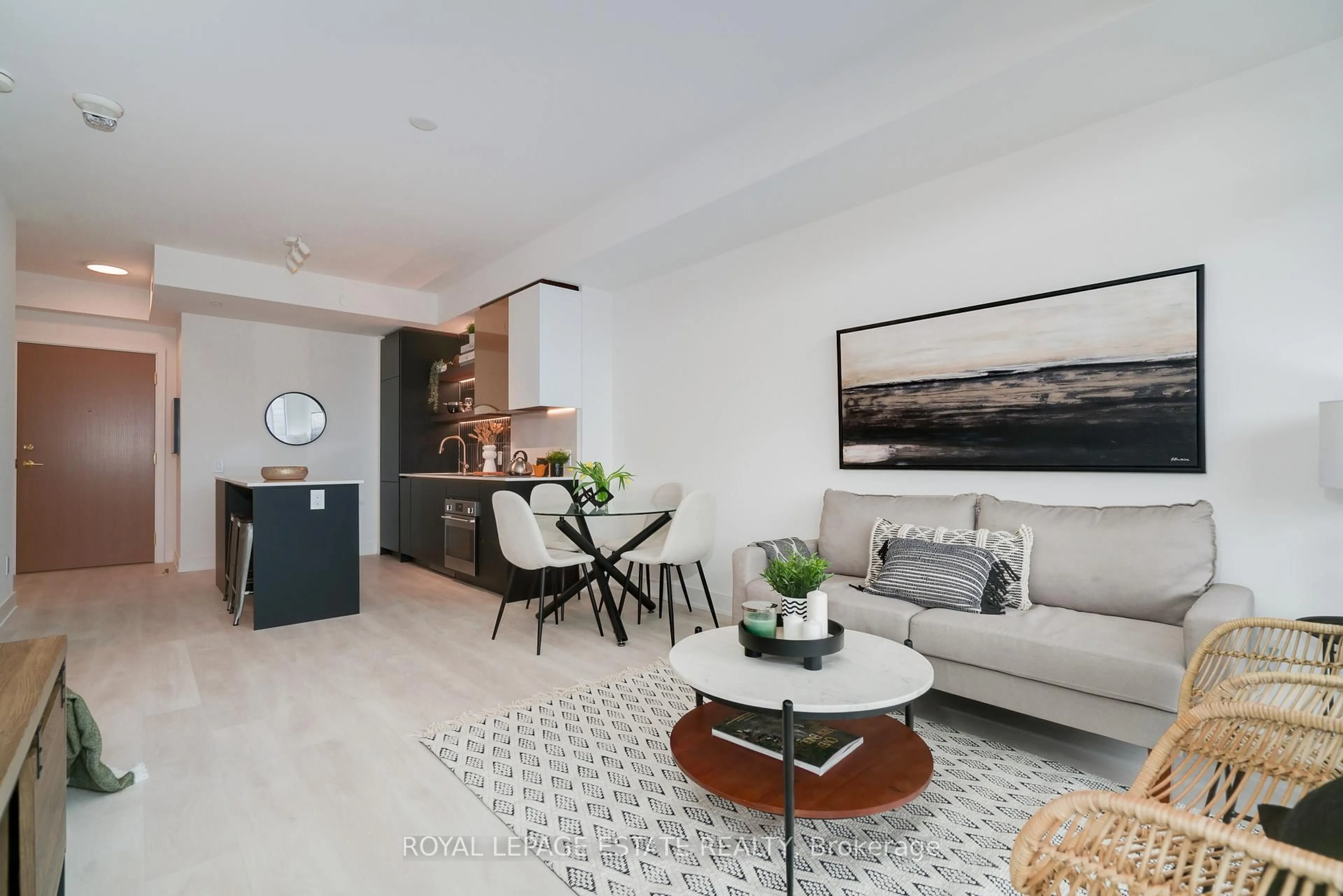 Living room with furniture, unknown for 1285 Queen St #404, Toronto Ontario M4L 0B6