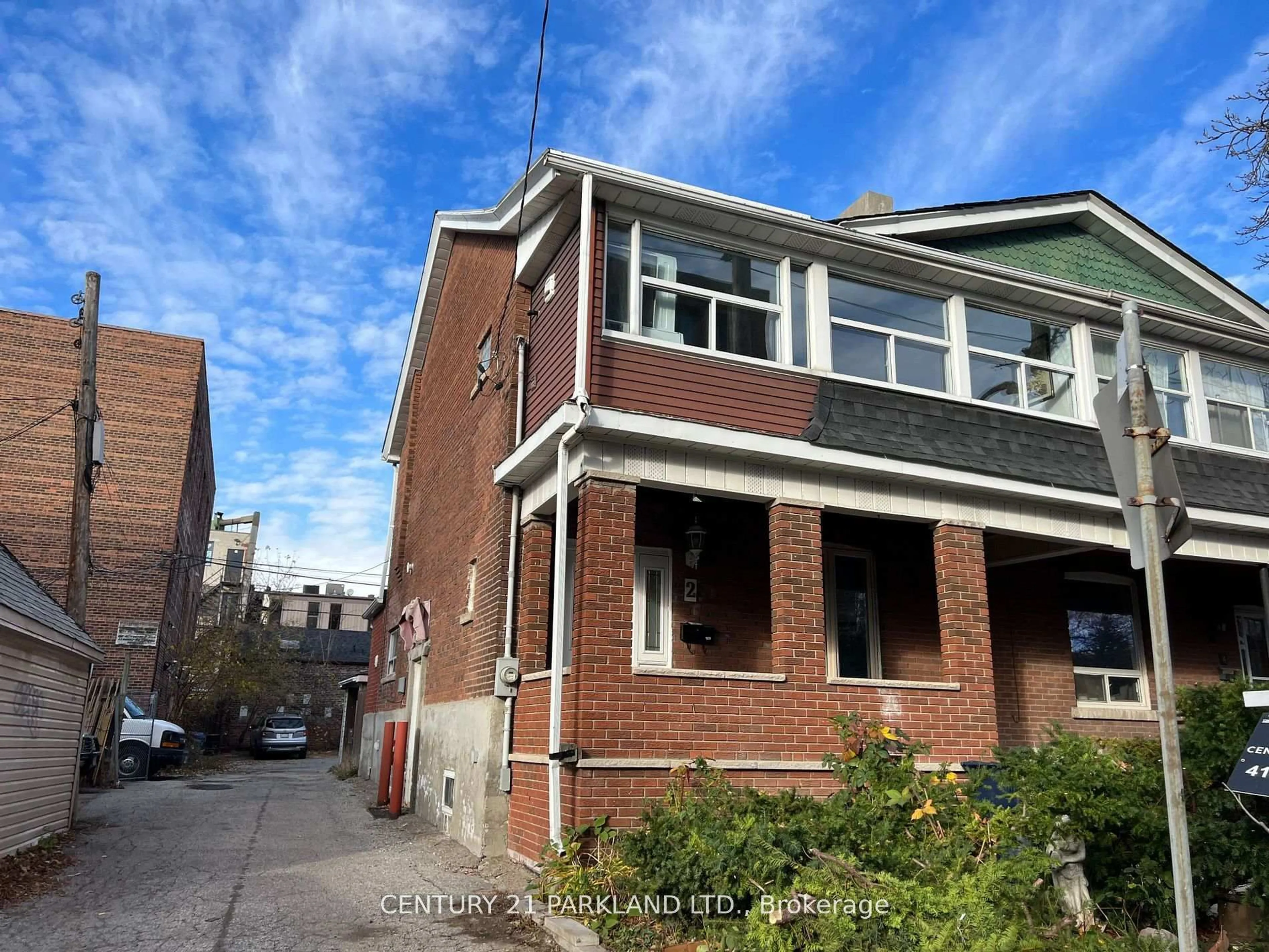 Home with brick exterior material, street for 2 Dearbourne Ave, Toronto Ontario M4K 1M7