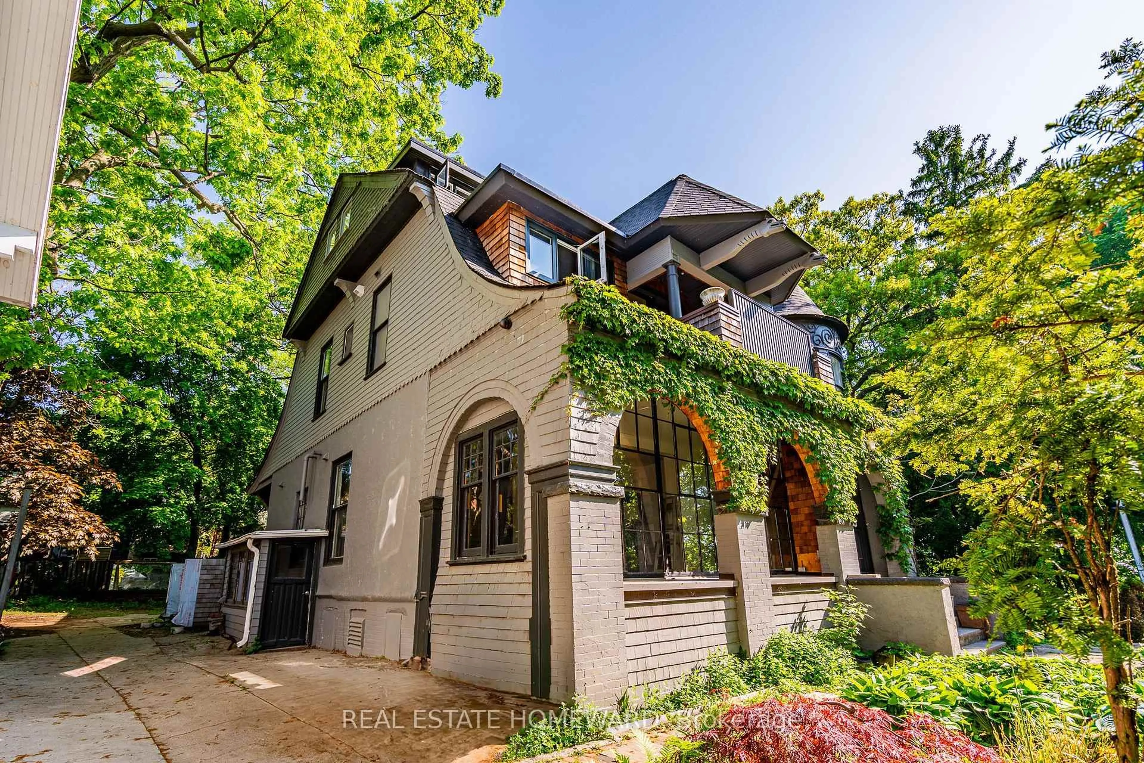 Home with brick exterior material, street for 3025 Queen St, Toronto Ontario M1N 1A5