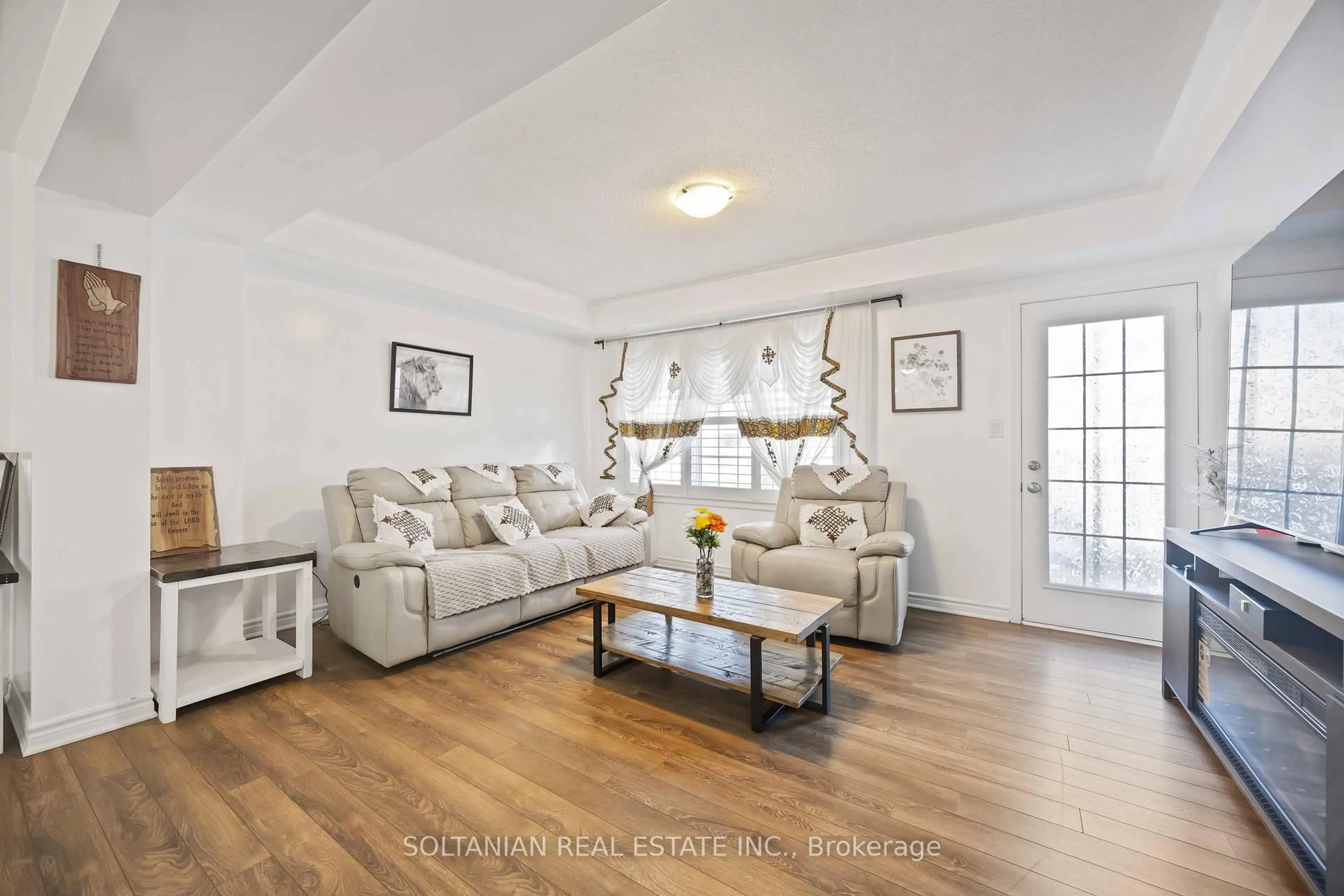 Living room with furniture, wood/laminate floor for 1103 Silk St, Pickering Ontario L1X 0E8