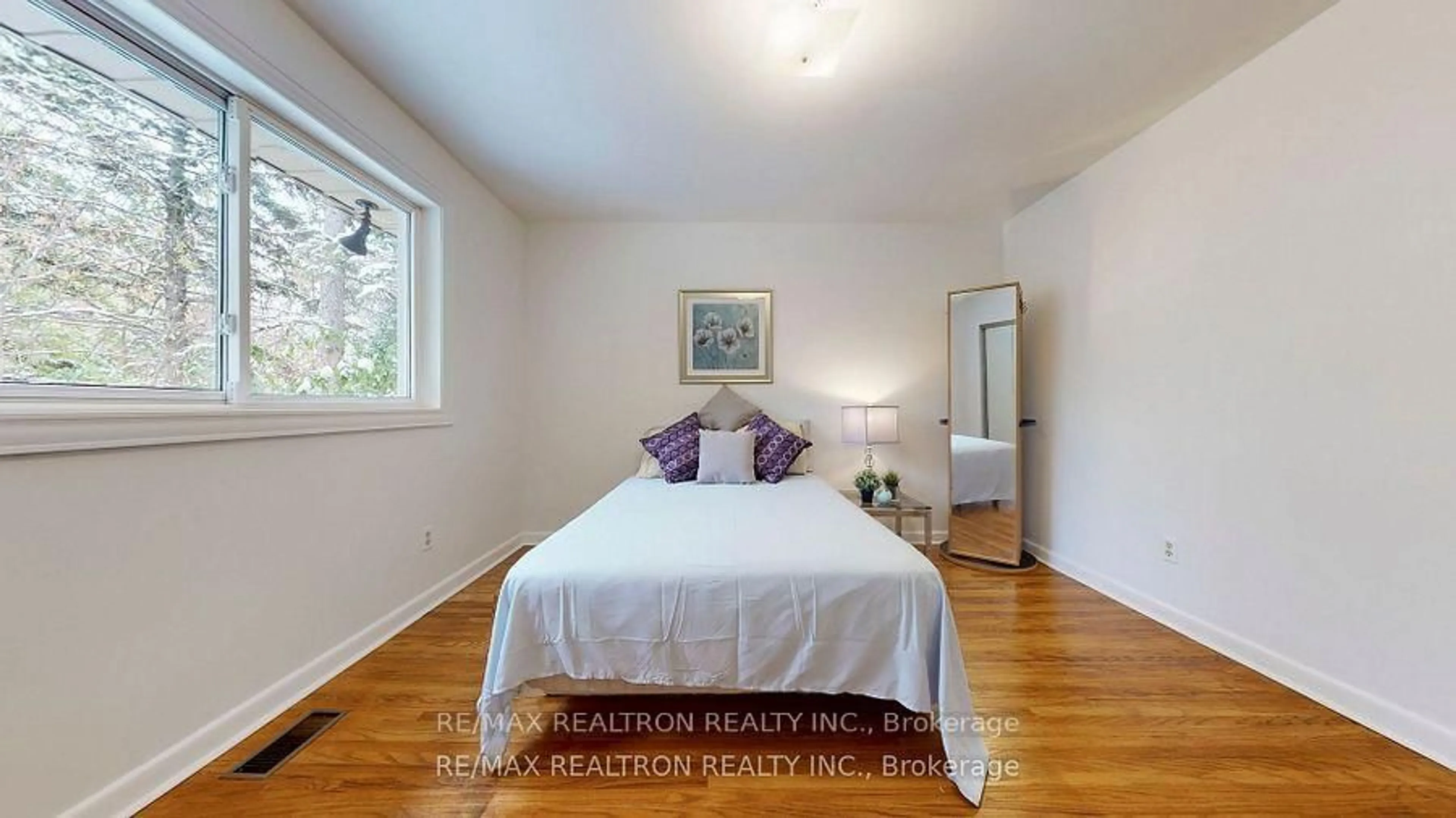 Bedroom with bed, wood/laminate floor for 69 Mossbank Dr, Toronto Ontario M1G 2C4