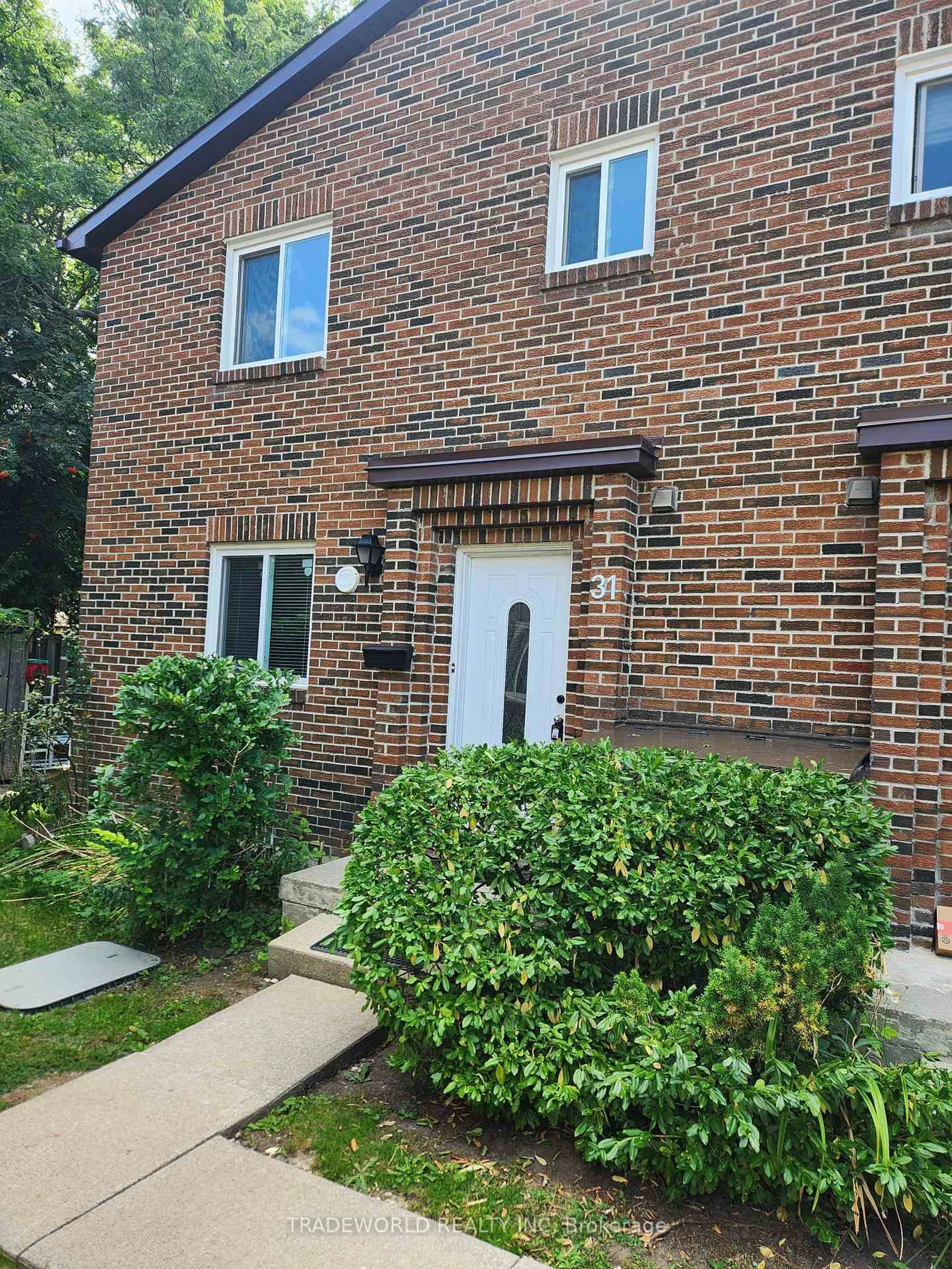 Home with brick exterior material, street for 72 Dusay Pl #31, Toronto Ontario M1W 2N2