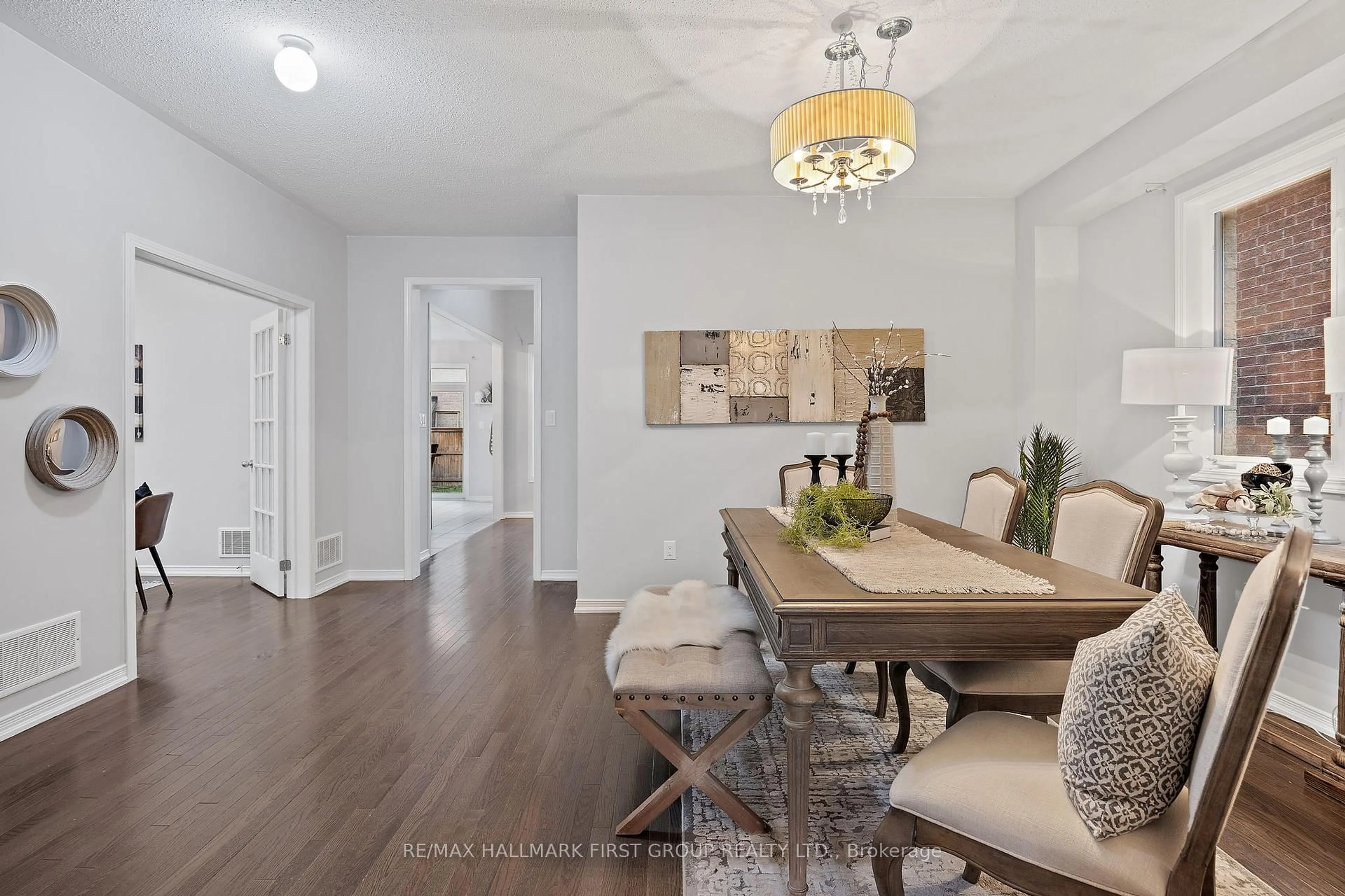 Dining room, wood/laminate floor for 55 Buttonshaw St, Clarington Ontario L1C 0S5