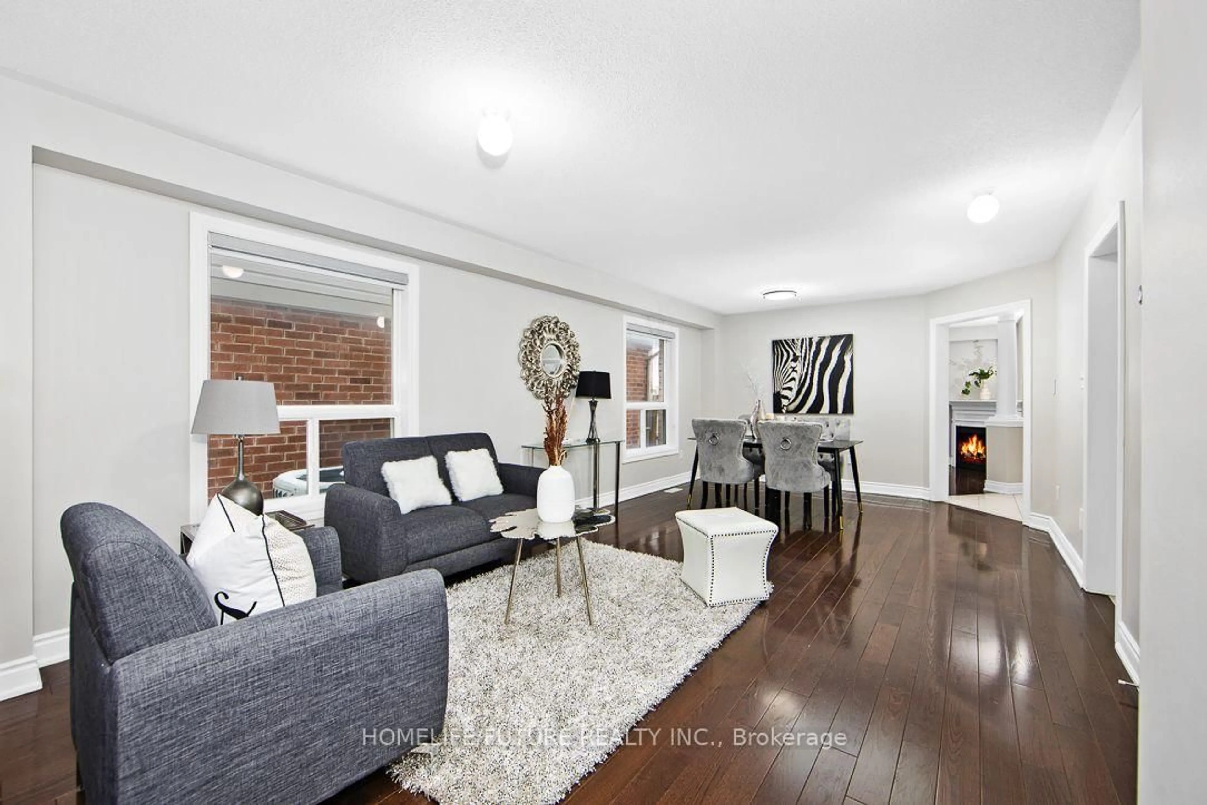 Living room with furniture, unknown for 39 Harkness Dr, Whitby Ontario L1R 0C5