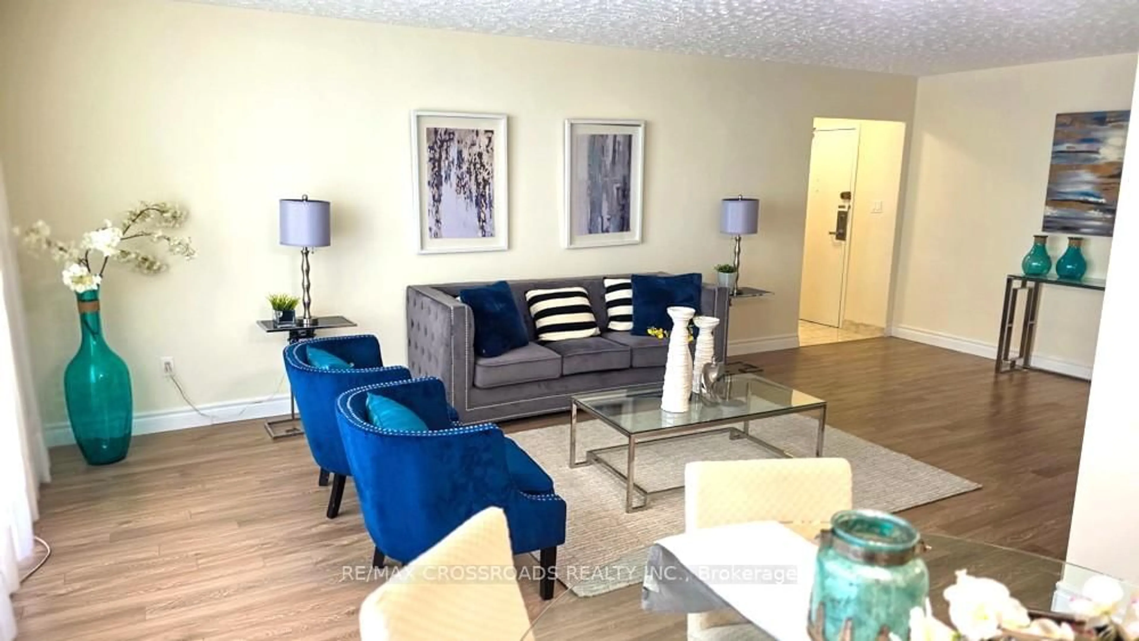 Living room with furniture, unknown for 5 Massey Sq #2311, Toronto Ontario M4C 5L6