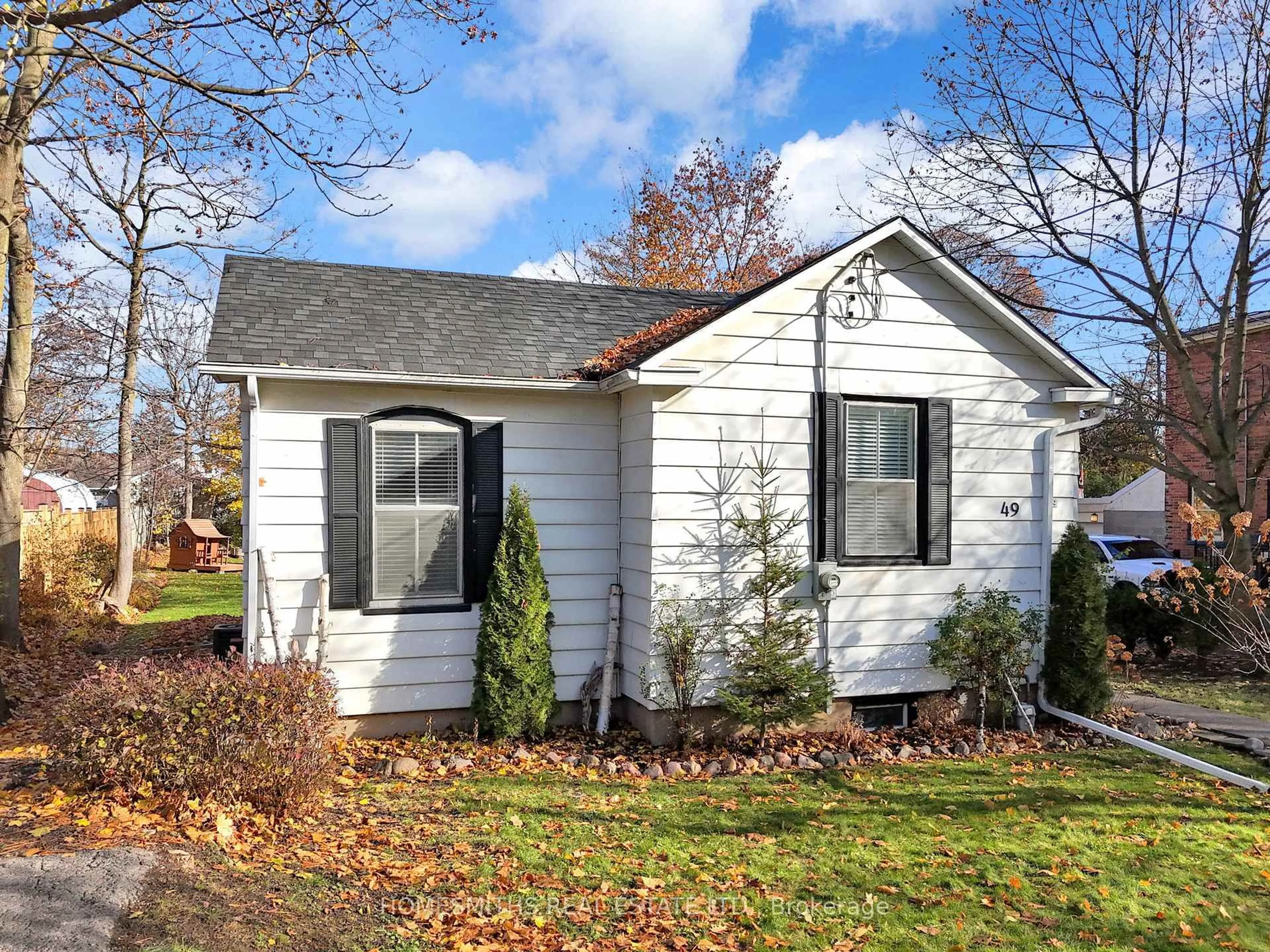 Home with vinyl exterior material, street for 49 Centre St, Clarington Ontario L1C 2Y2