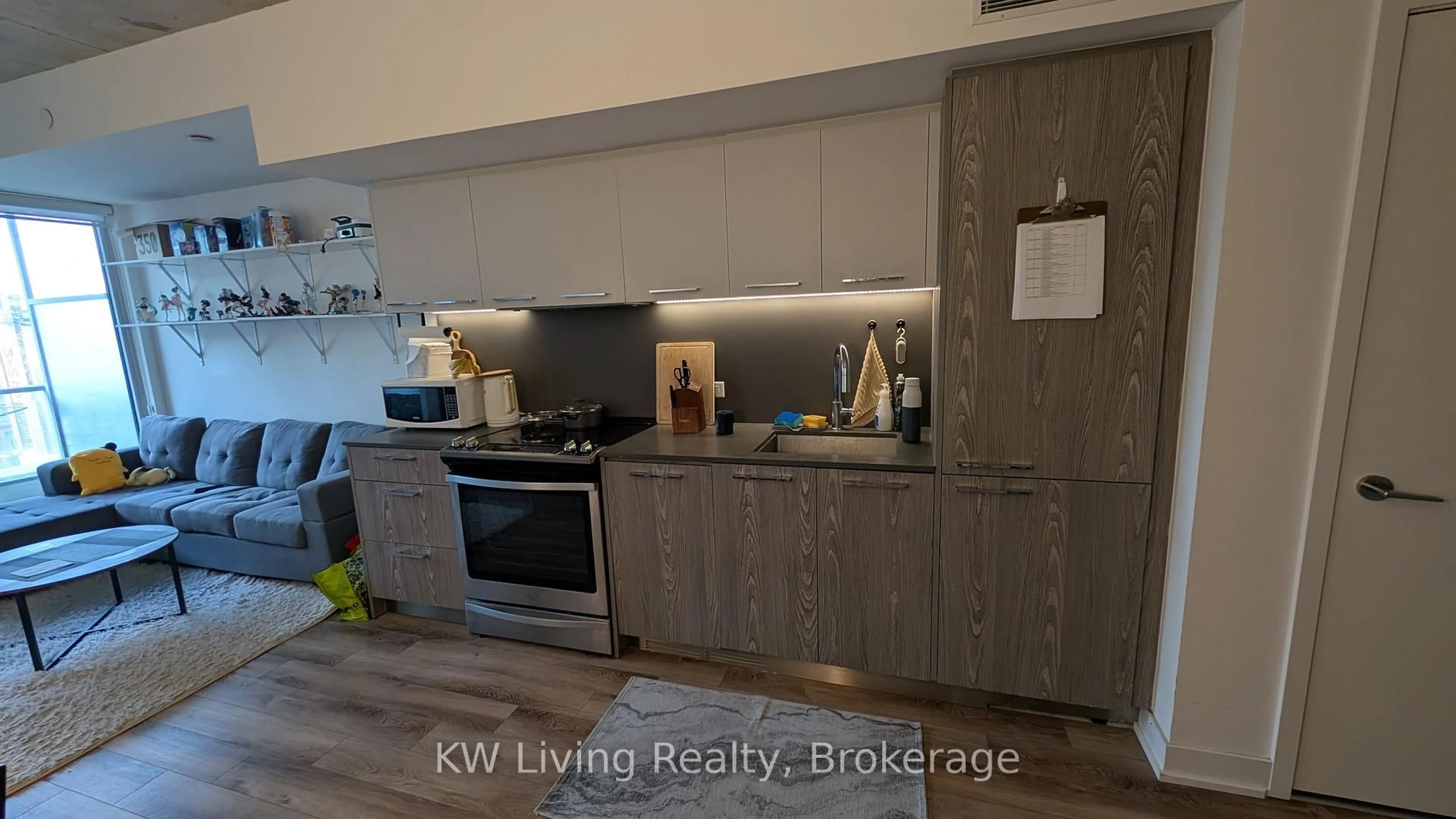 Open concept kitchen, wood/laminate floor for 30 Baseball Pl #425, Toronto Ontario M4M 0E8